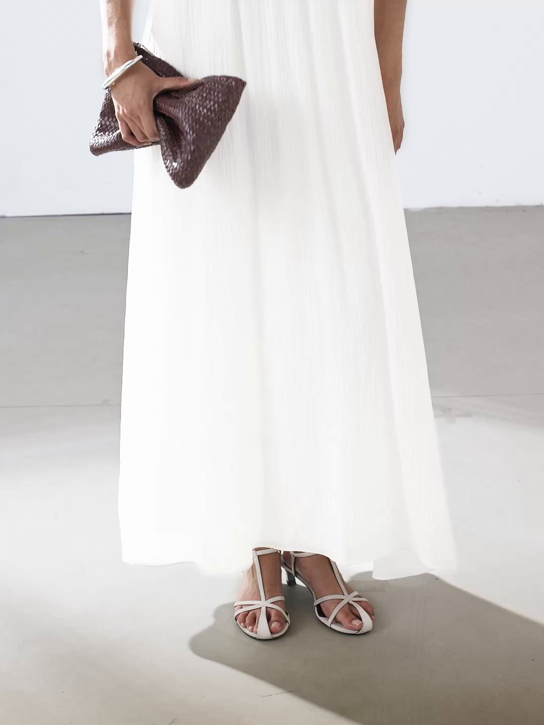 Long pleated dress with gathered detail