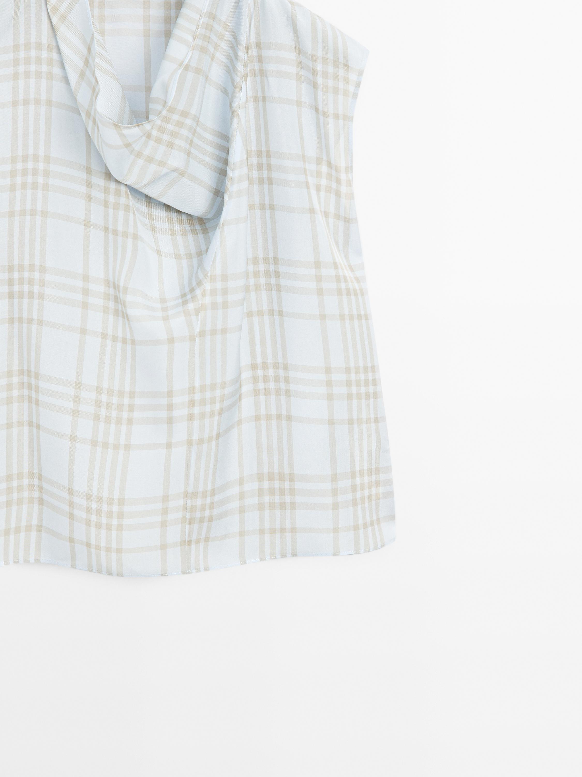 Draped neck check top
