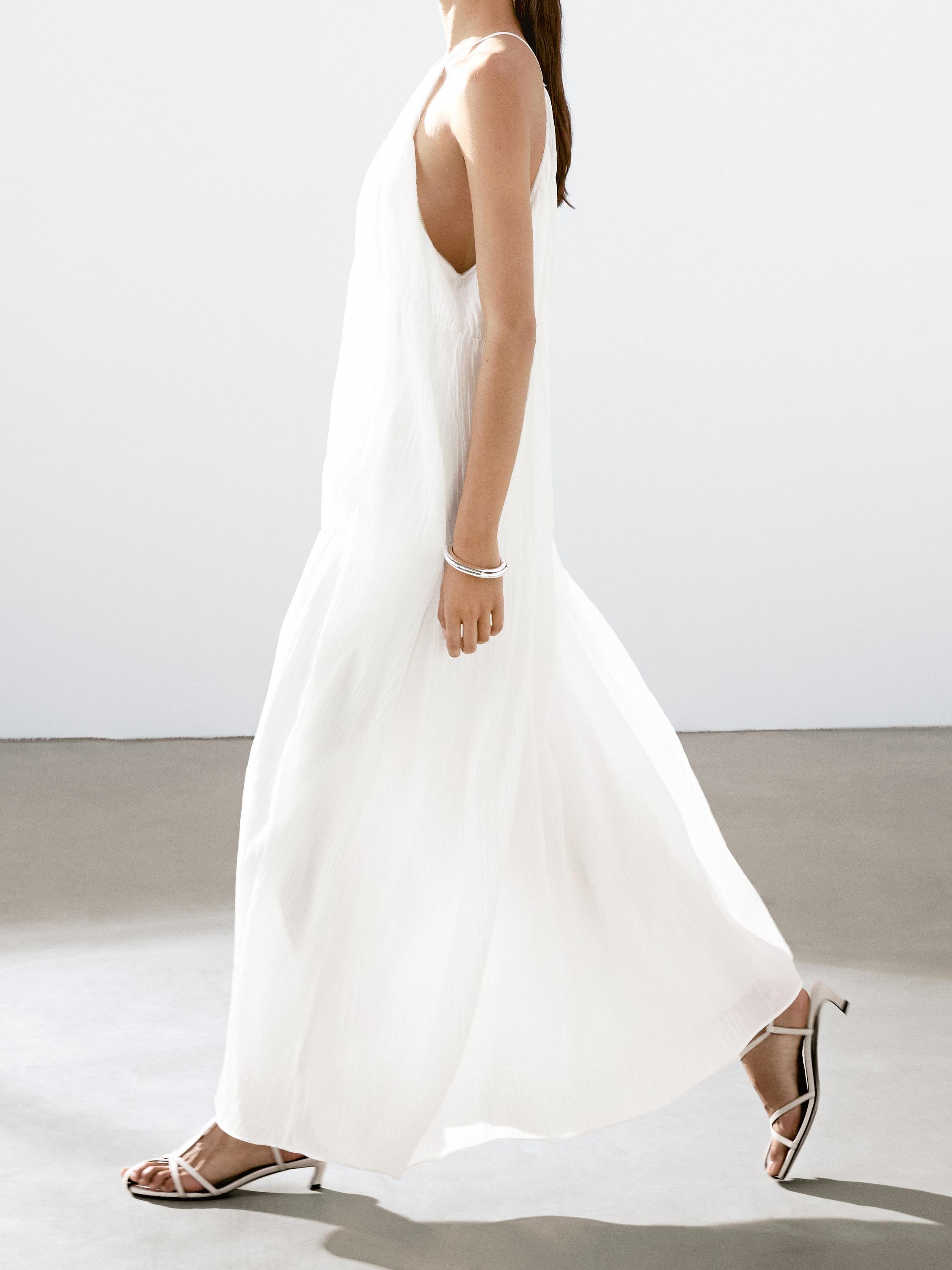 Long pleated dress with gathered detail