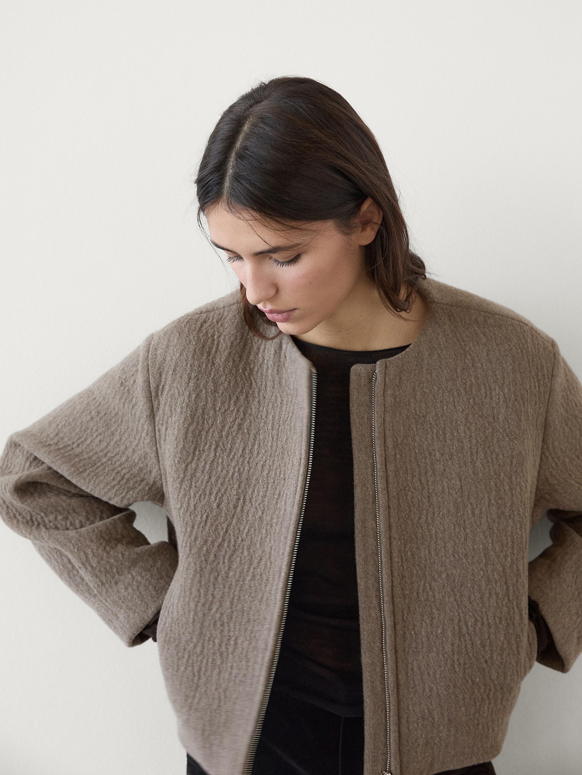 Wool blend jacket with pleated detail