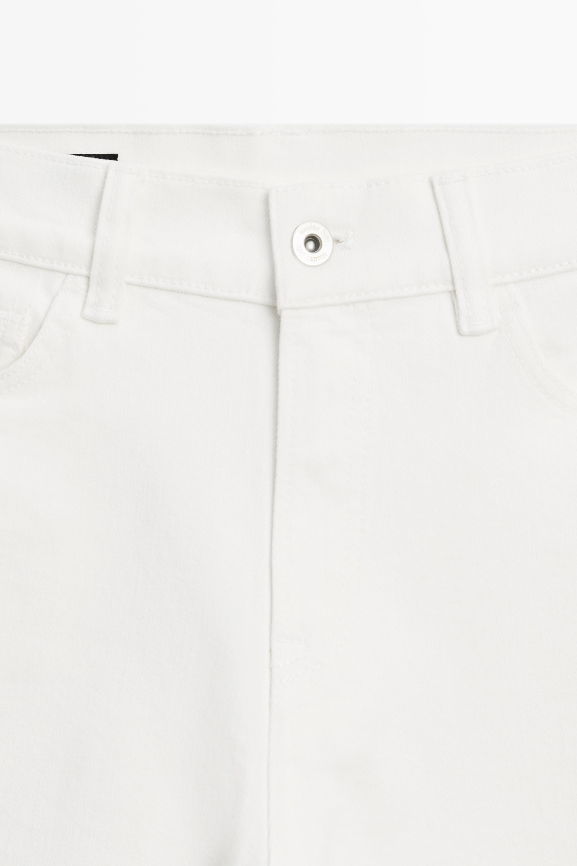 Mid-rise capri jeans with turn-up hems — Off white