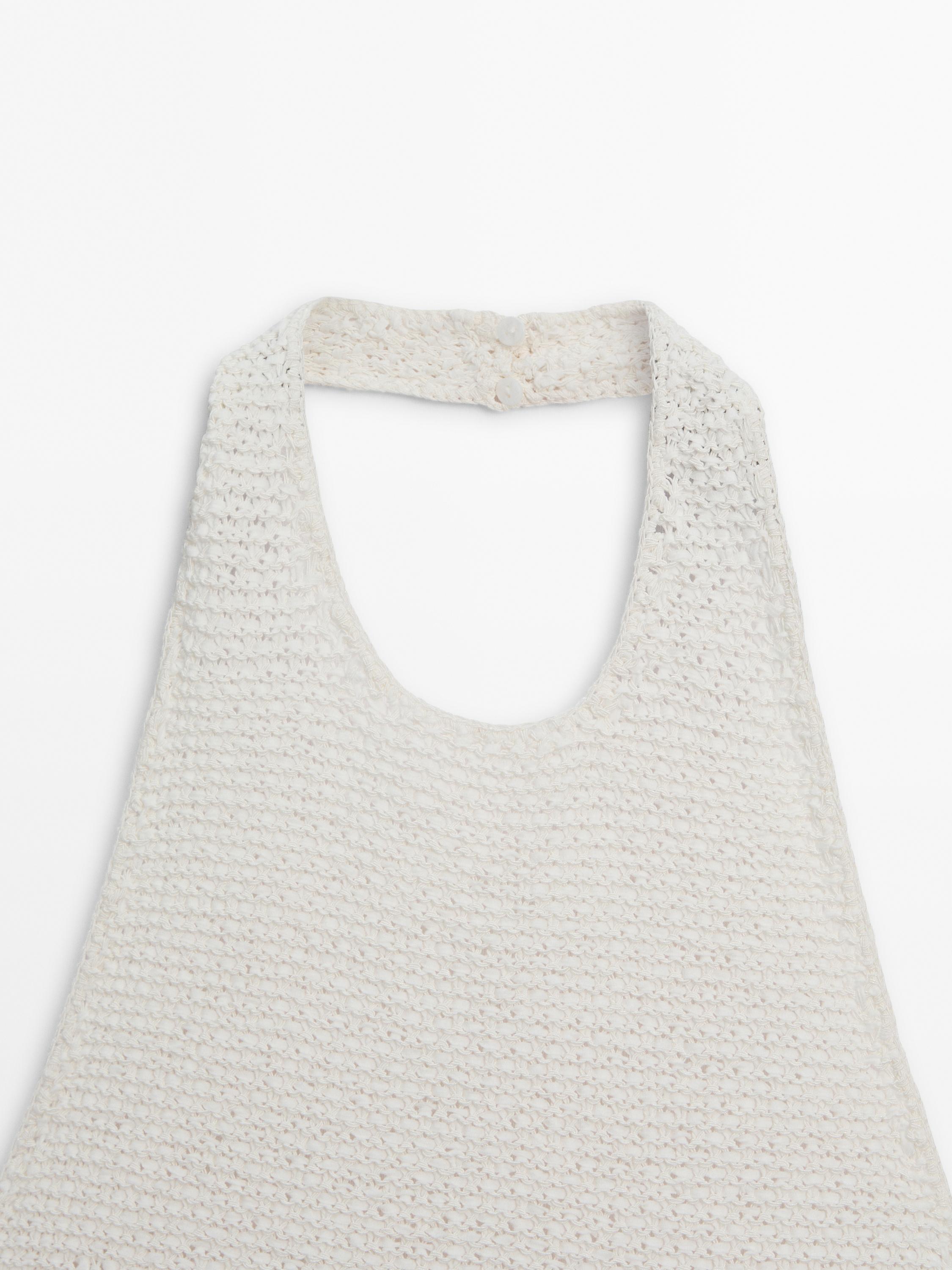 Halterneck top with low-cut back