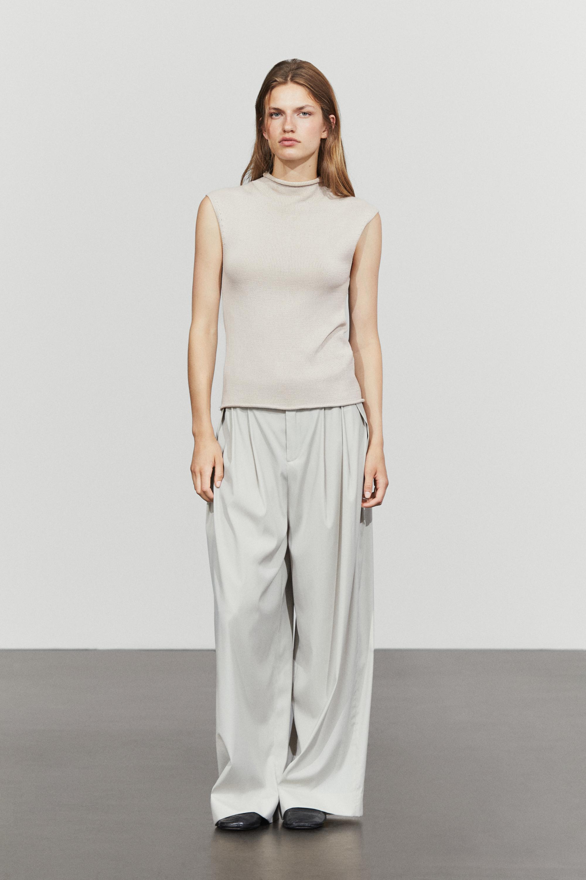Cotton blend high neck knit top — STONE