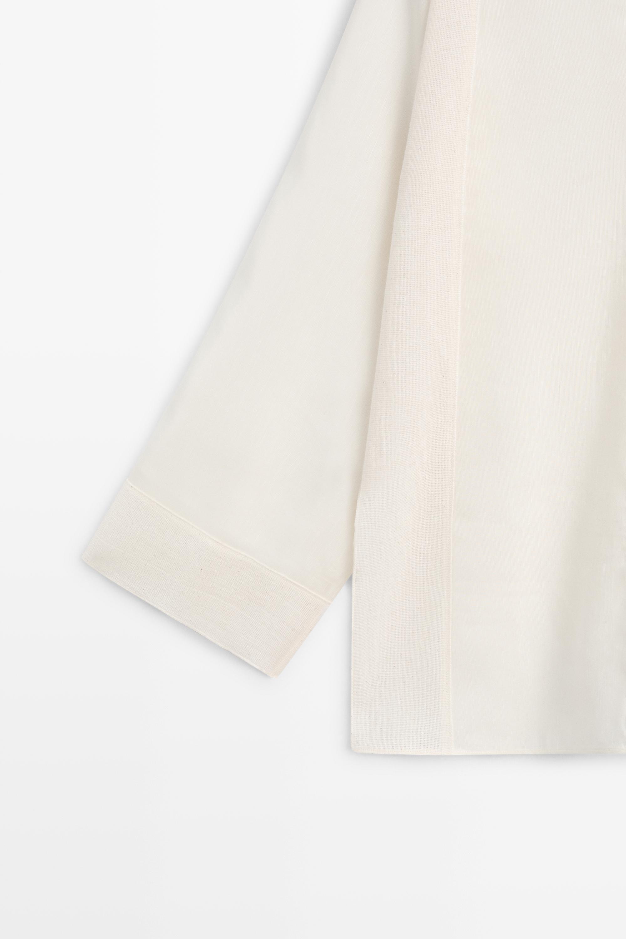 Flowing blouse with seam details — CREAM