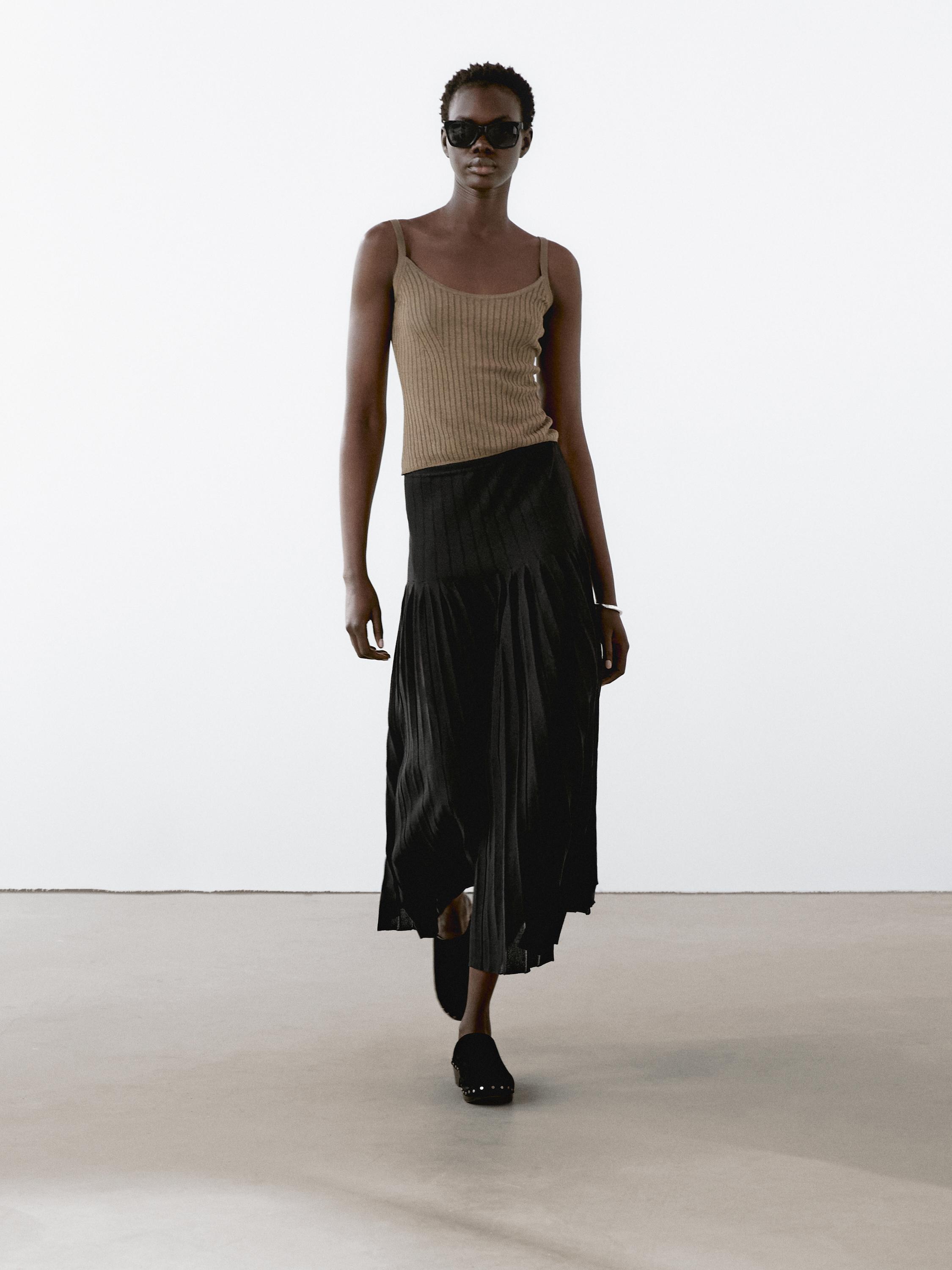 Top punto tirantes detalle rib