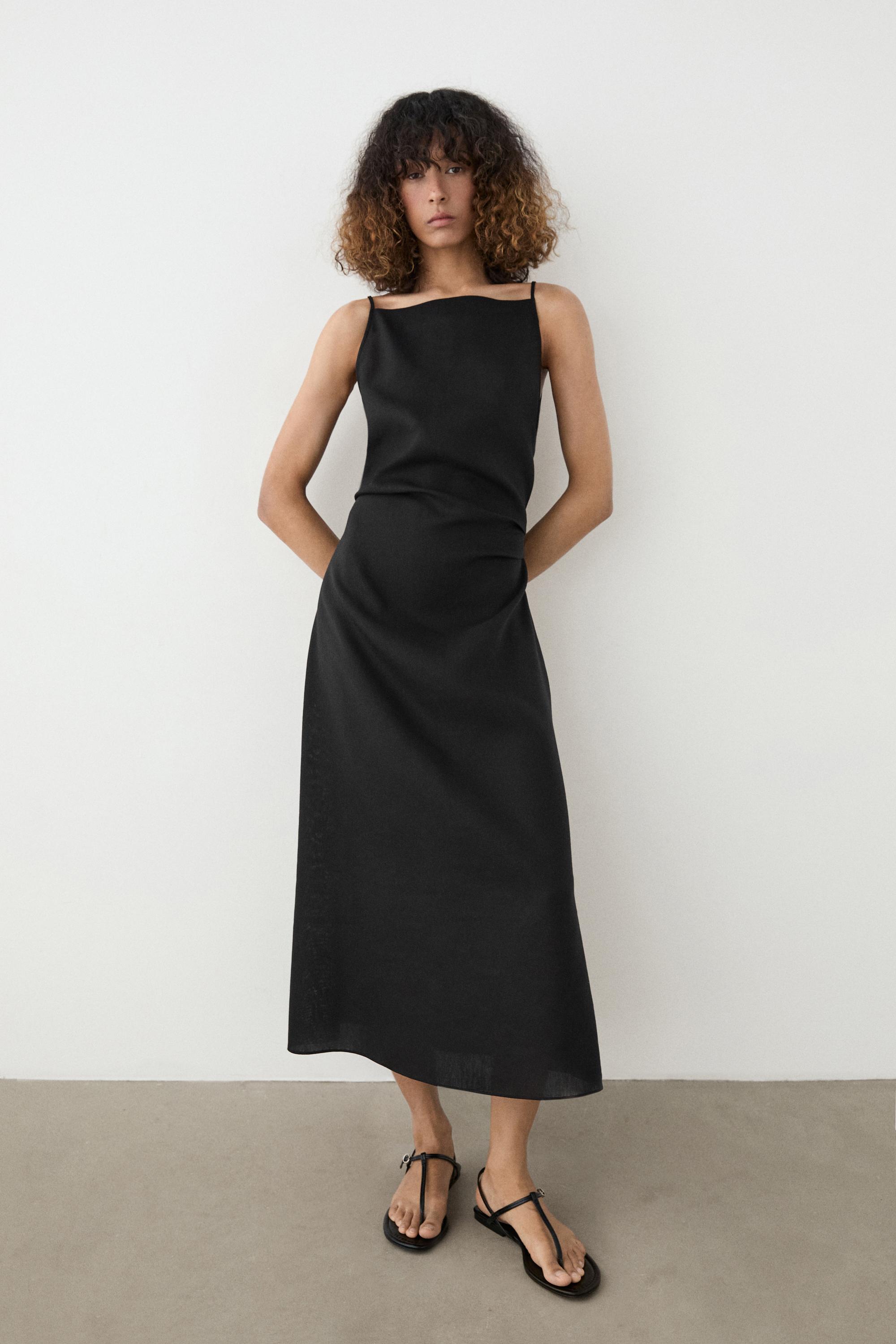 spaghetti strap black dress Mermaid Satin making it perfect for any formal event Spaghetti Straps Black Sheath Side