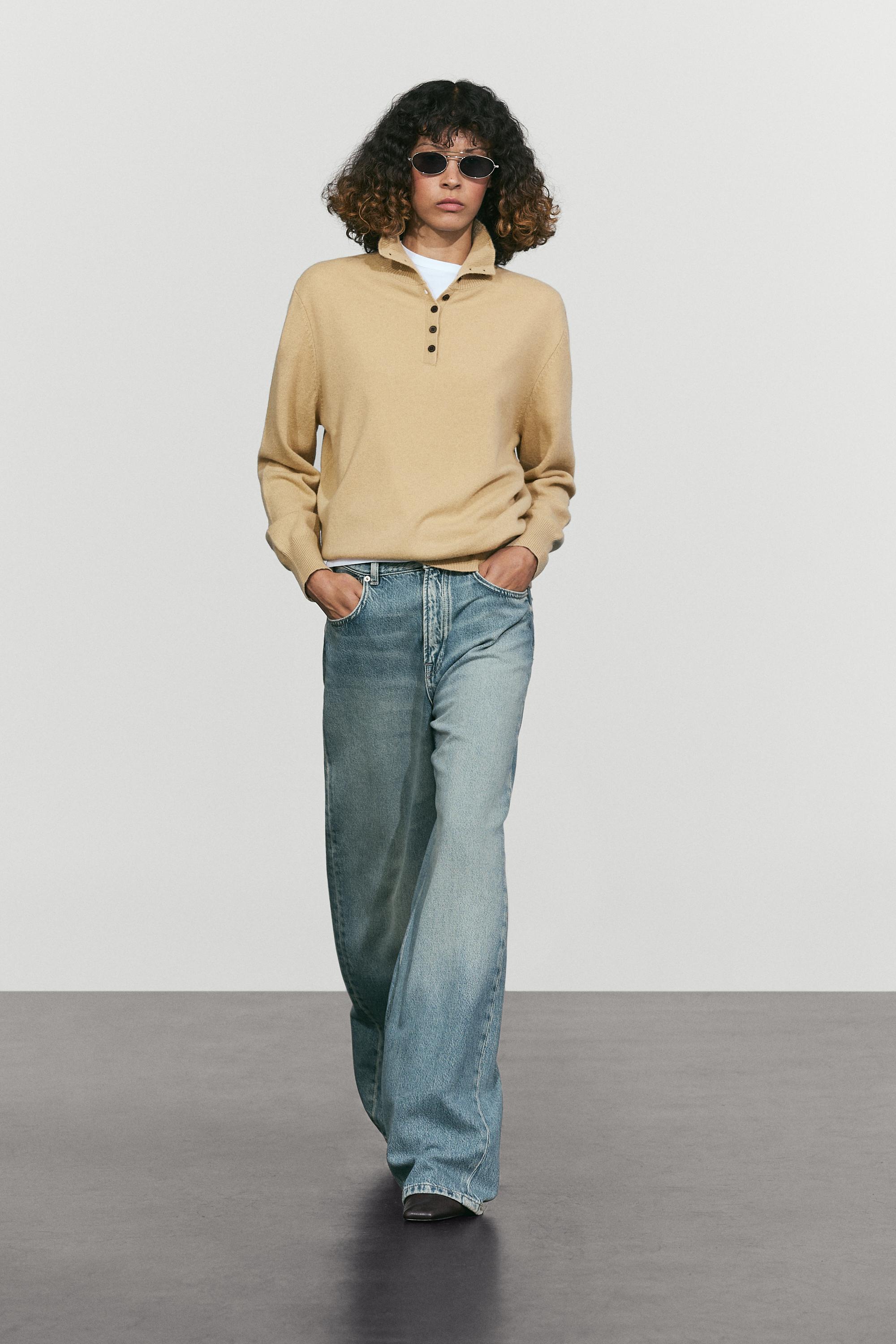 High neck knit sweater with button detail