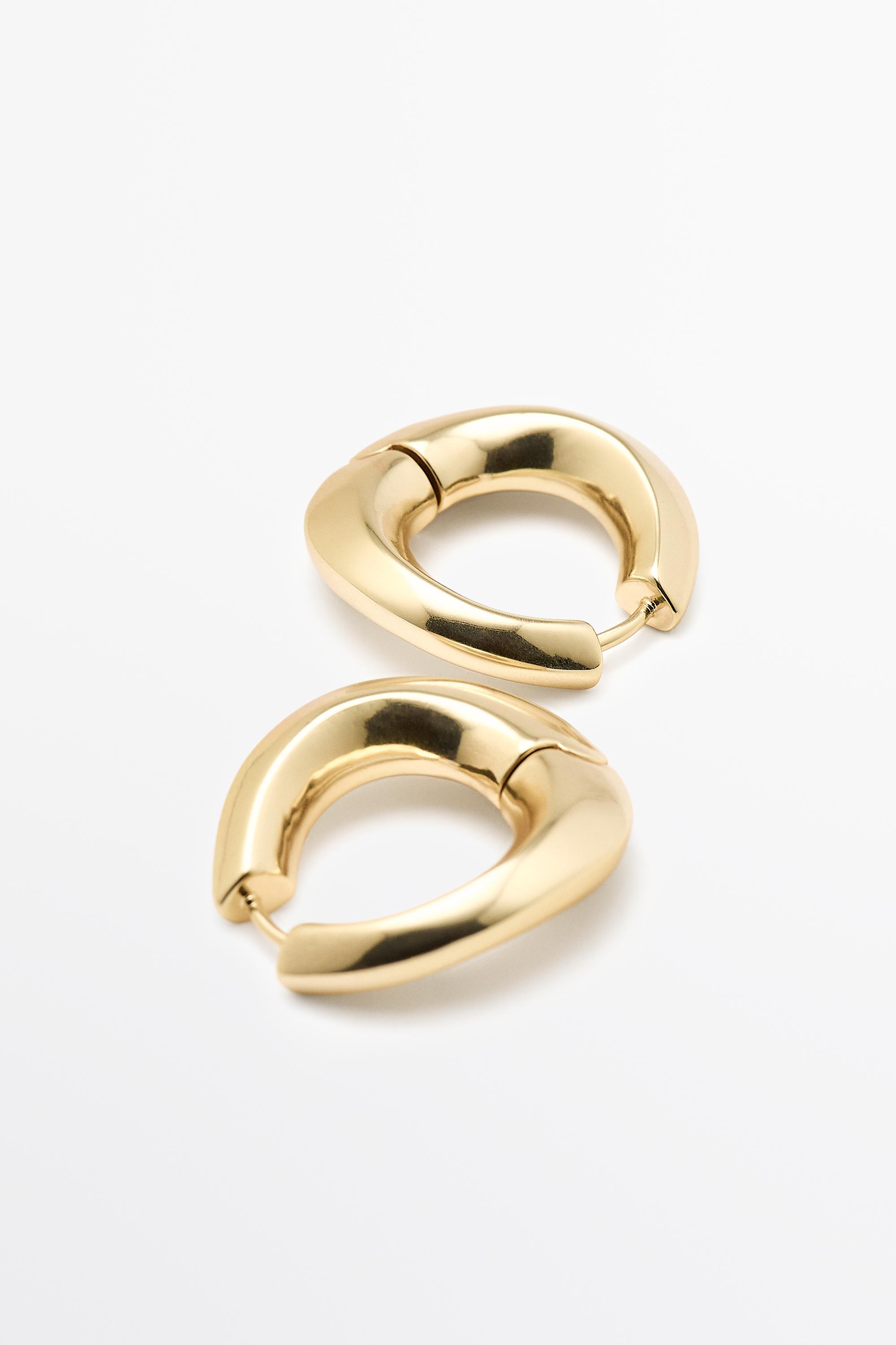Voluminous hoop earrings — GOLDEN