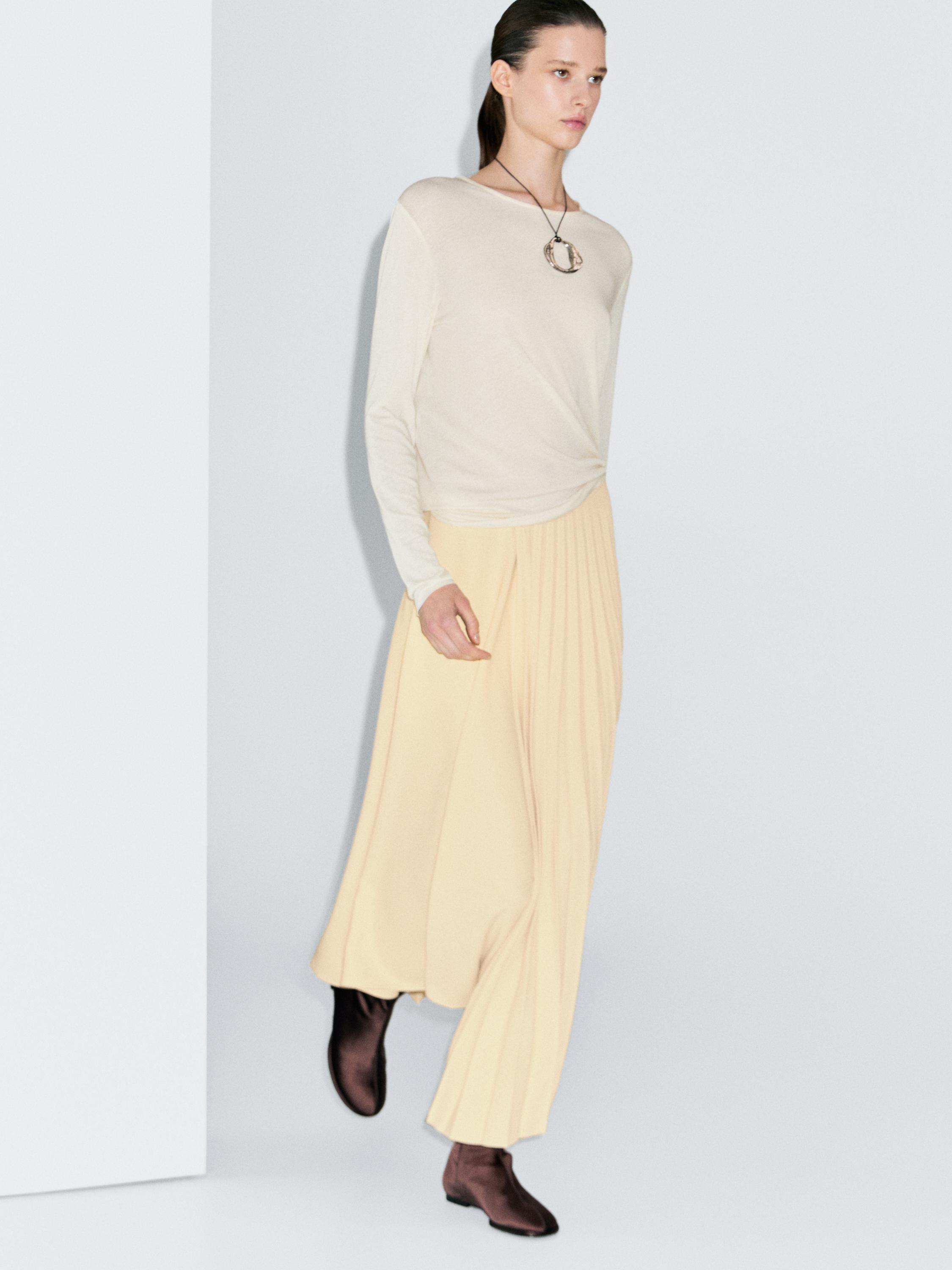 Asymmetric box pleat skirt