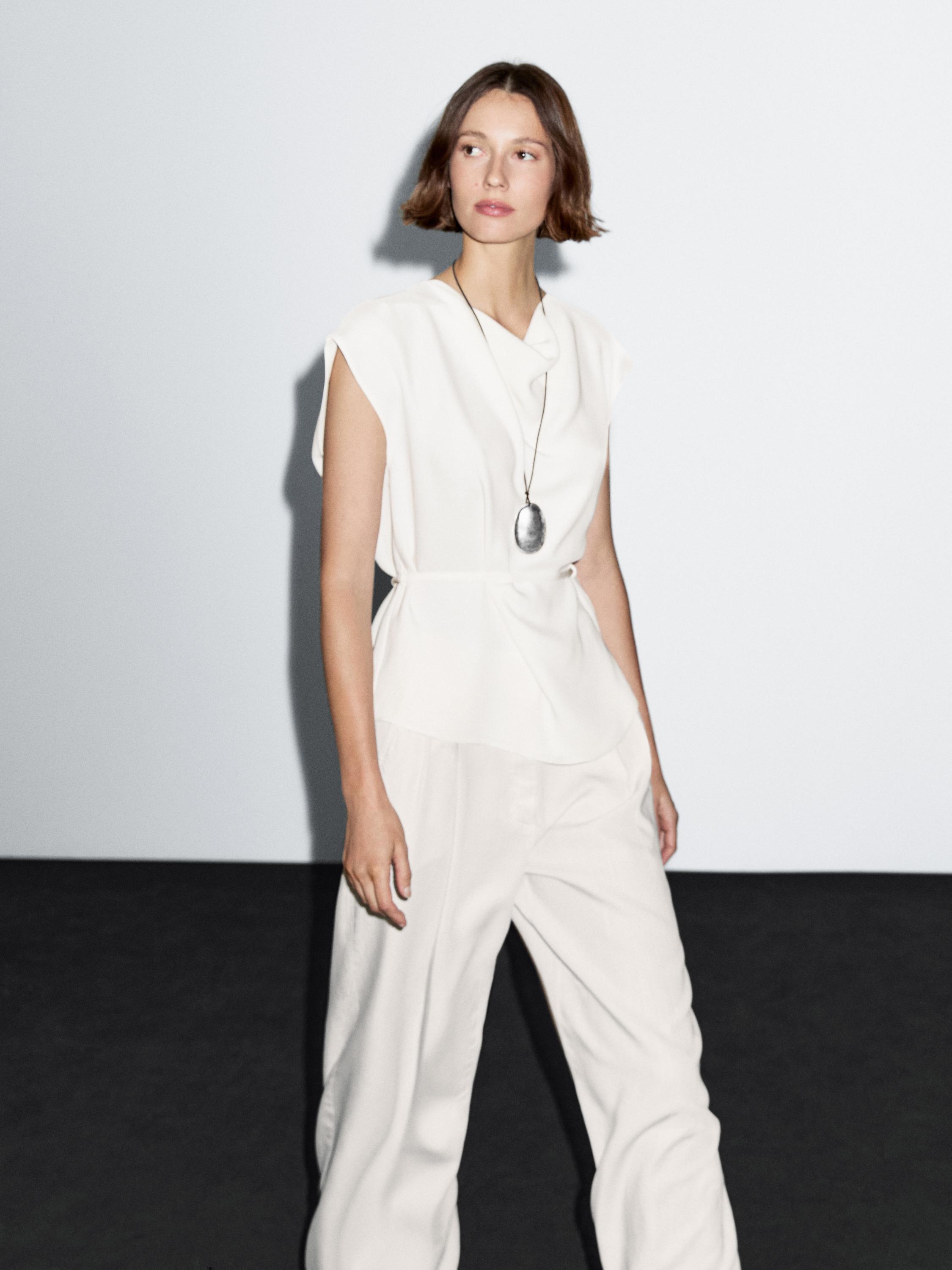 Pantallona me këmbë të gjera me pensë të dyfishtë