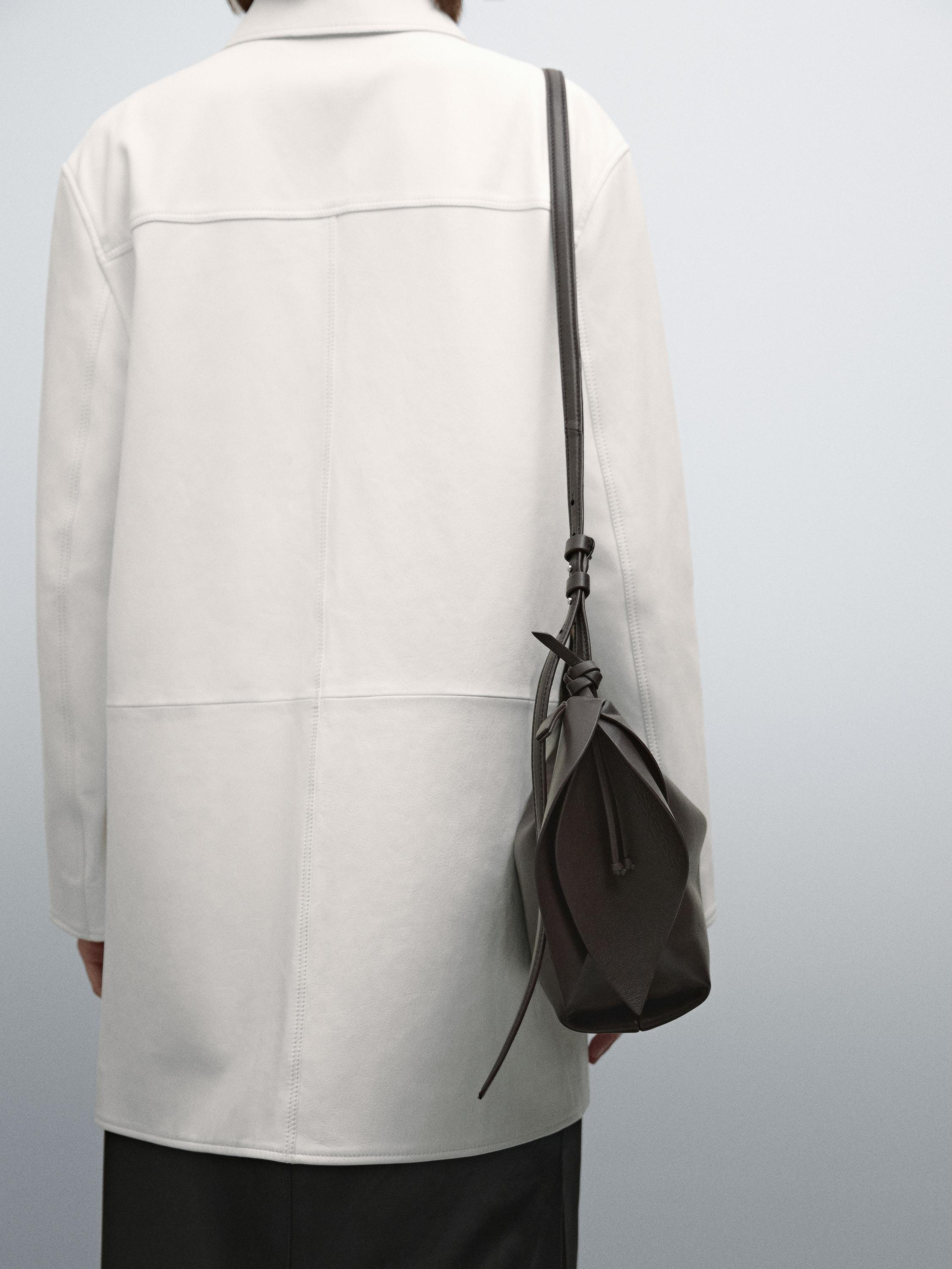 Nappa leather crossbody bag with flower detail