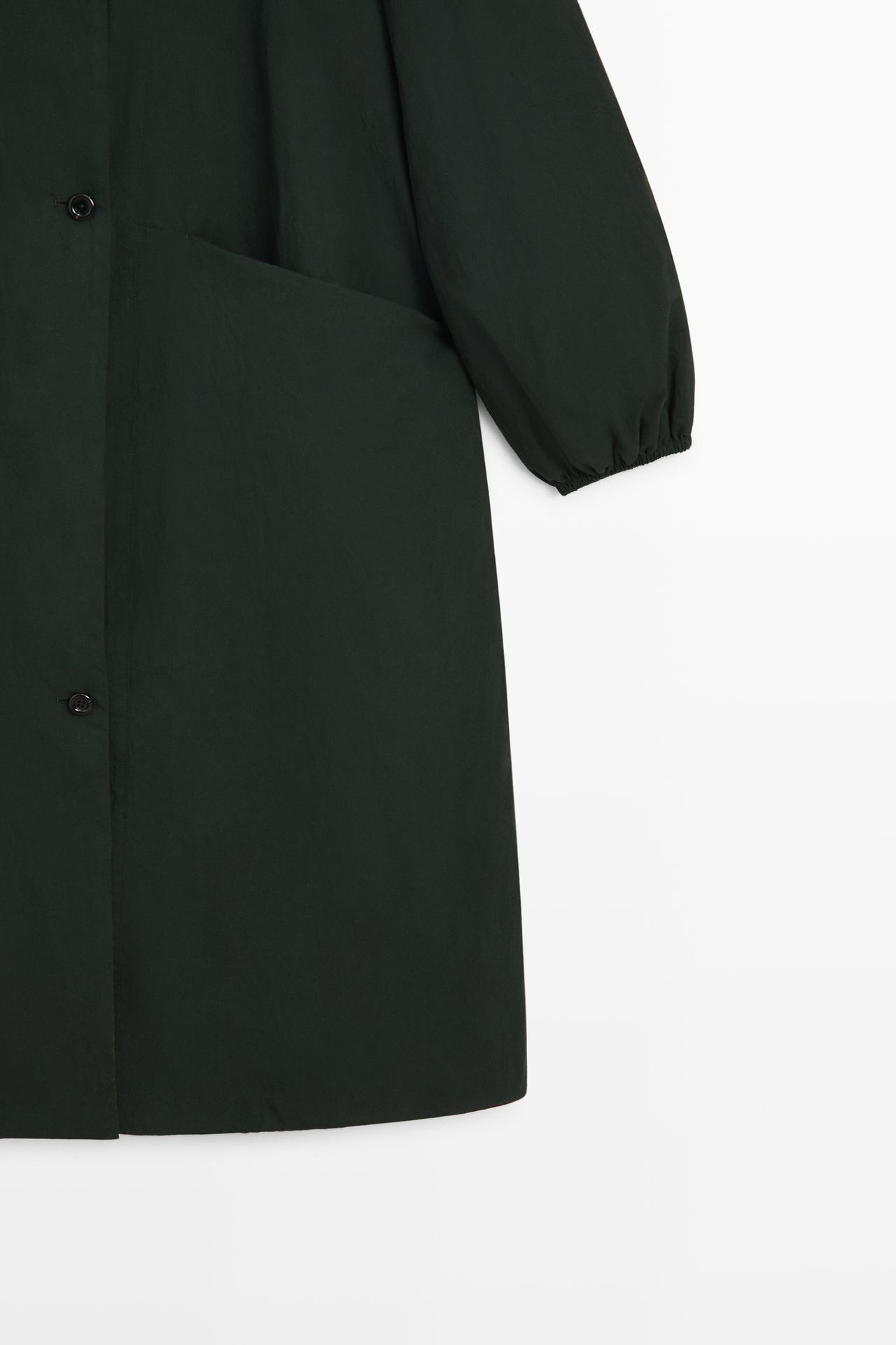 Long technical parka — PETROL BLUE