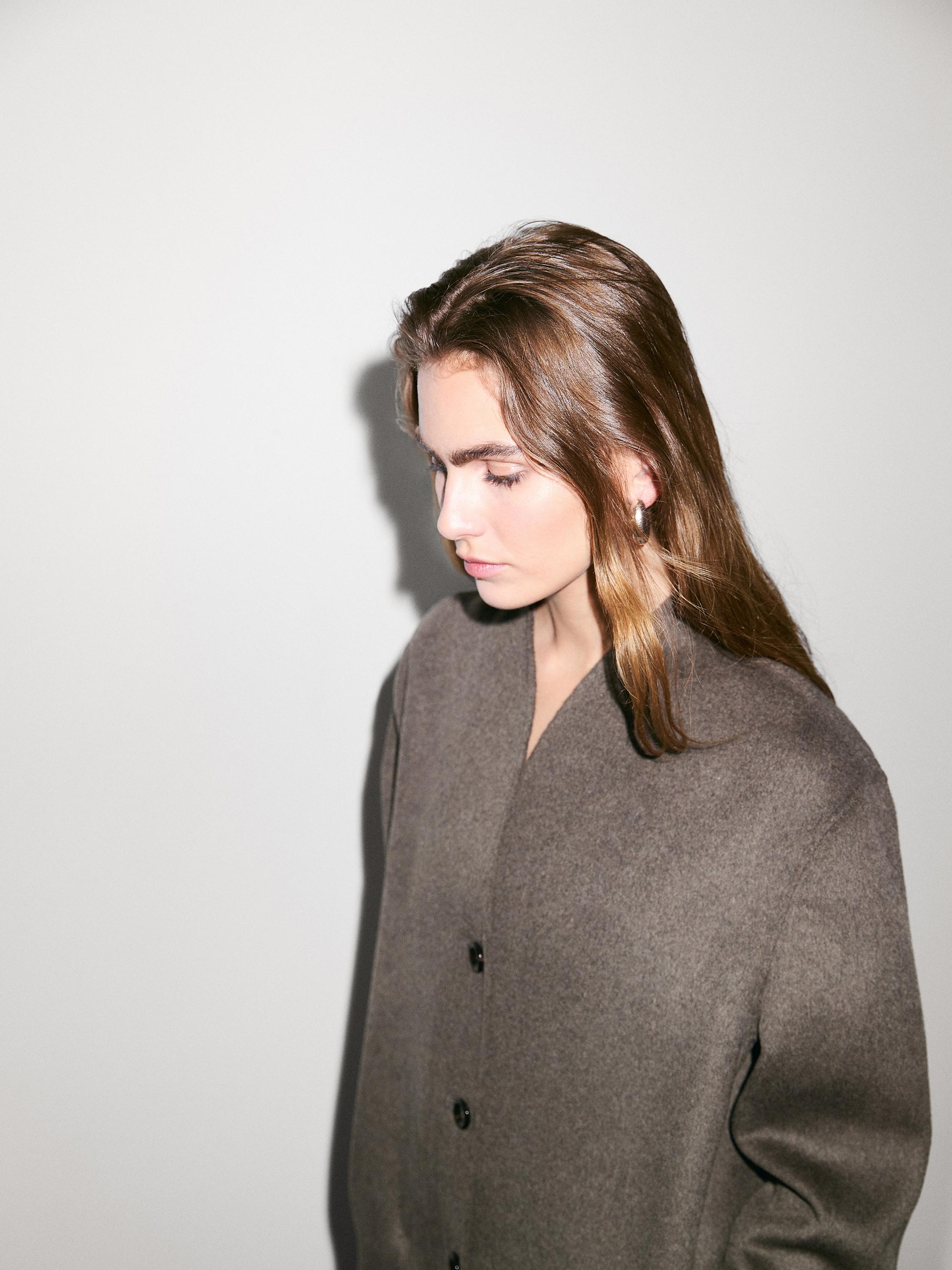 Mantel leher tinggi campuran wol