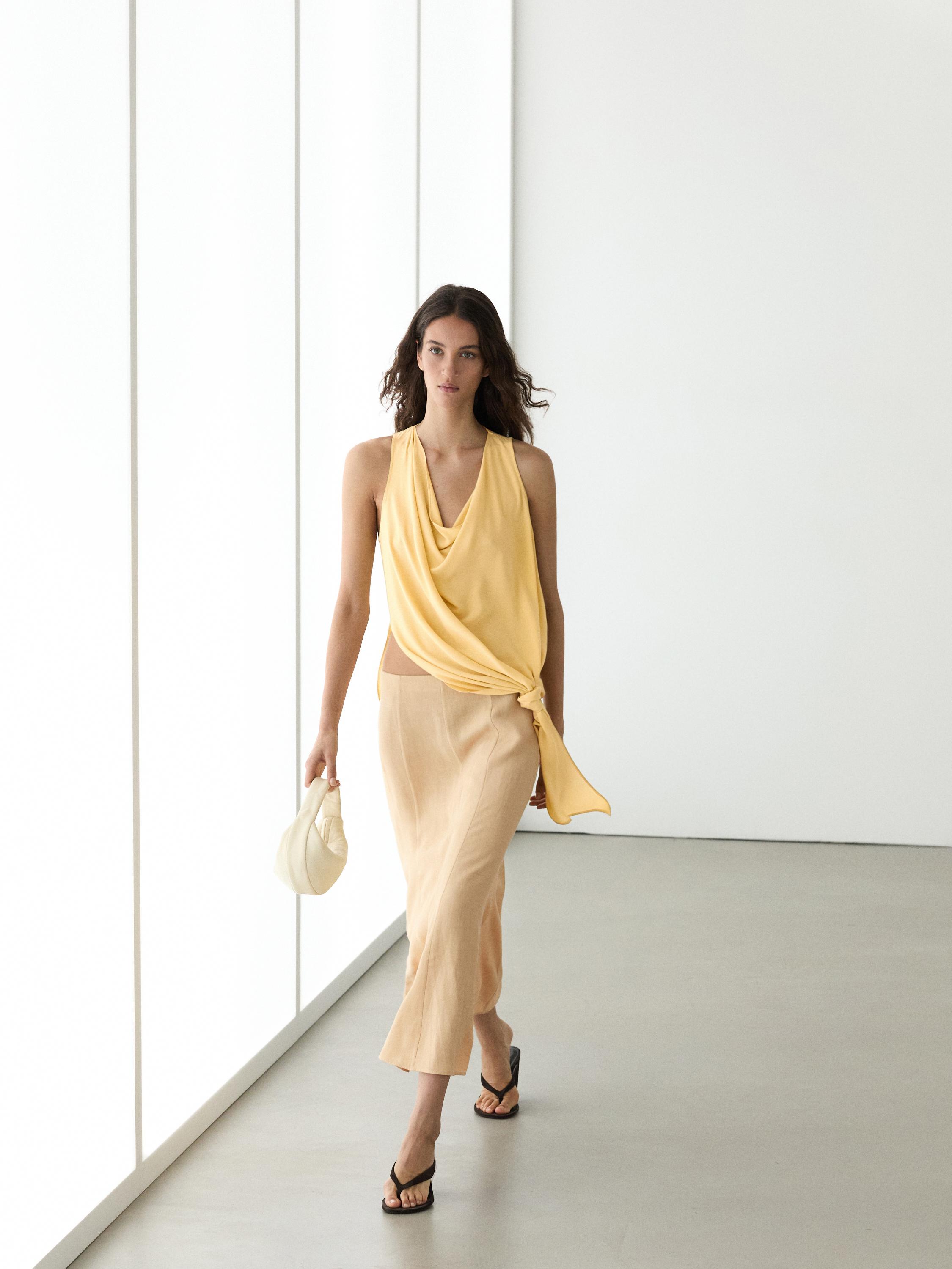 Flowing flared skirt — PALE YELLOW