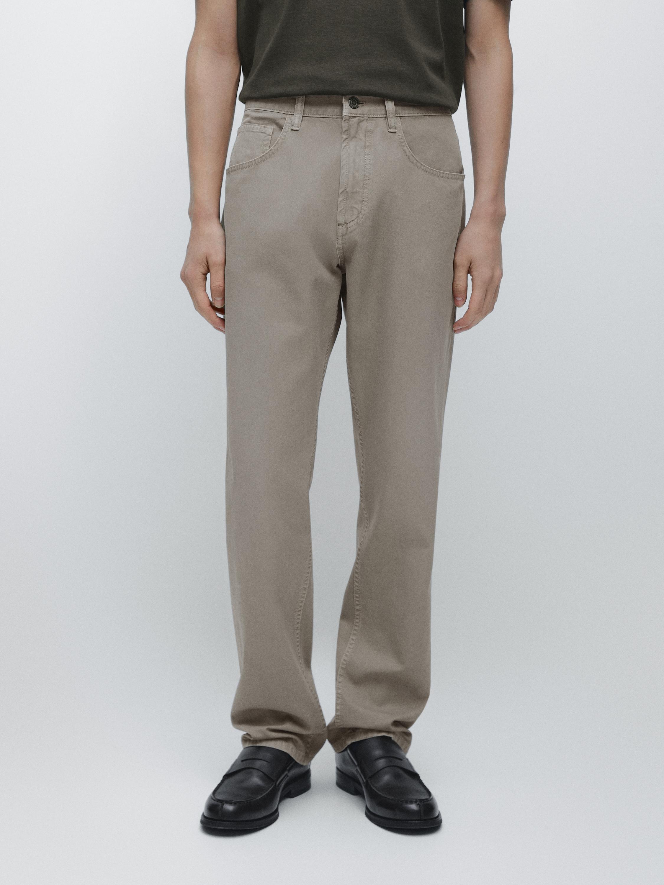 Светлозелен опуштен тексас комплет со странични џебови и предно копче.