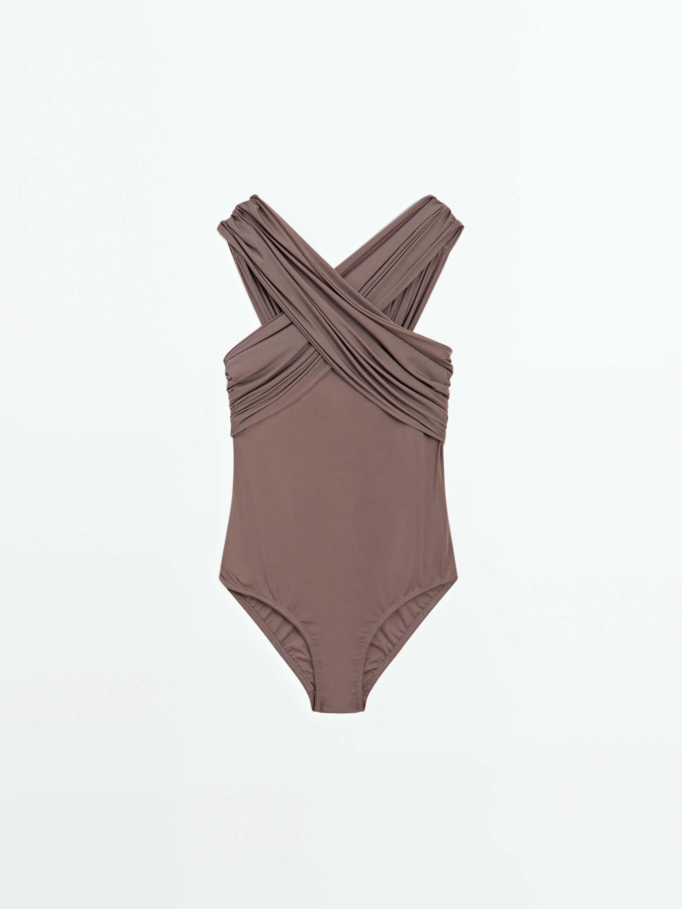 Bandeau swimsuit with criss-cross straps