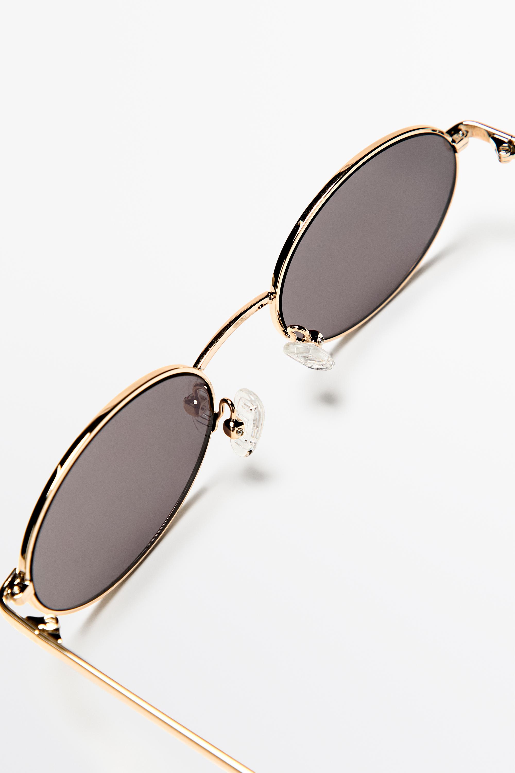Metallic oval sunglasses — GREEN