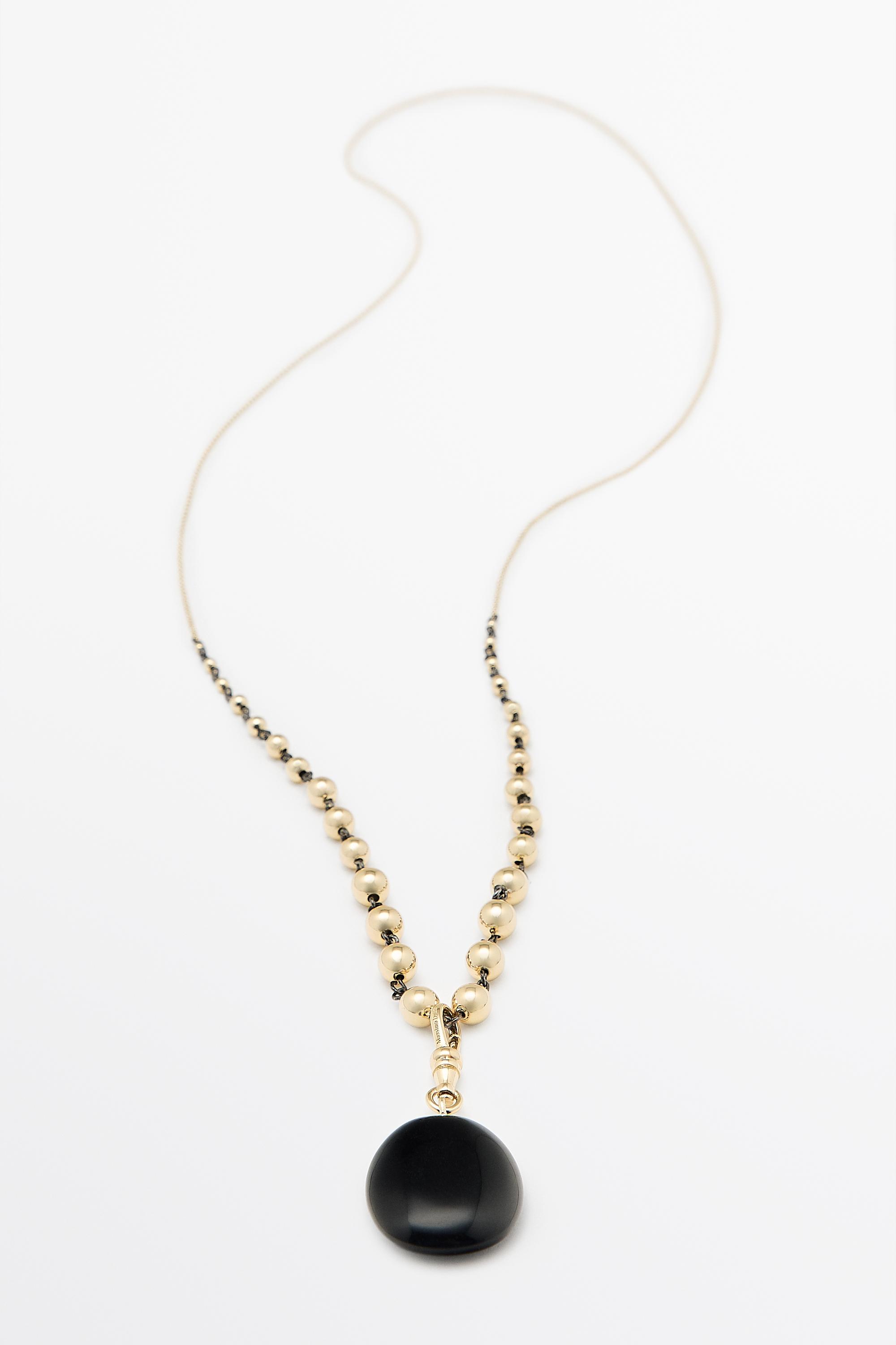 Beaded chain necklace with onyx piece — GOLDEN
