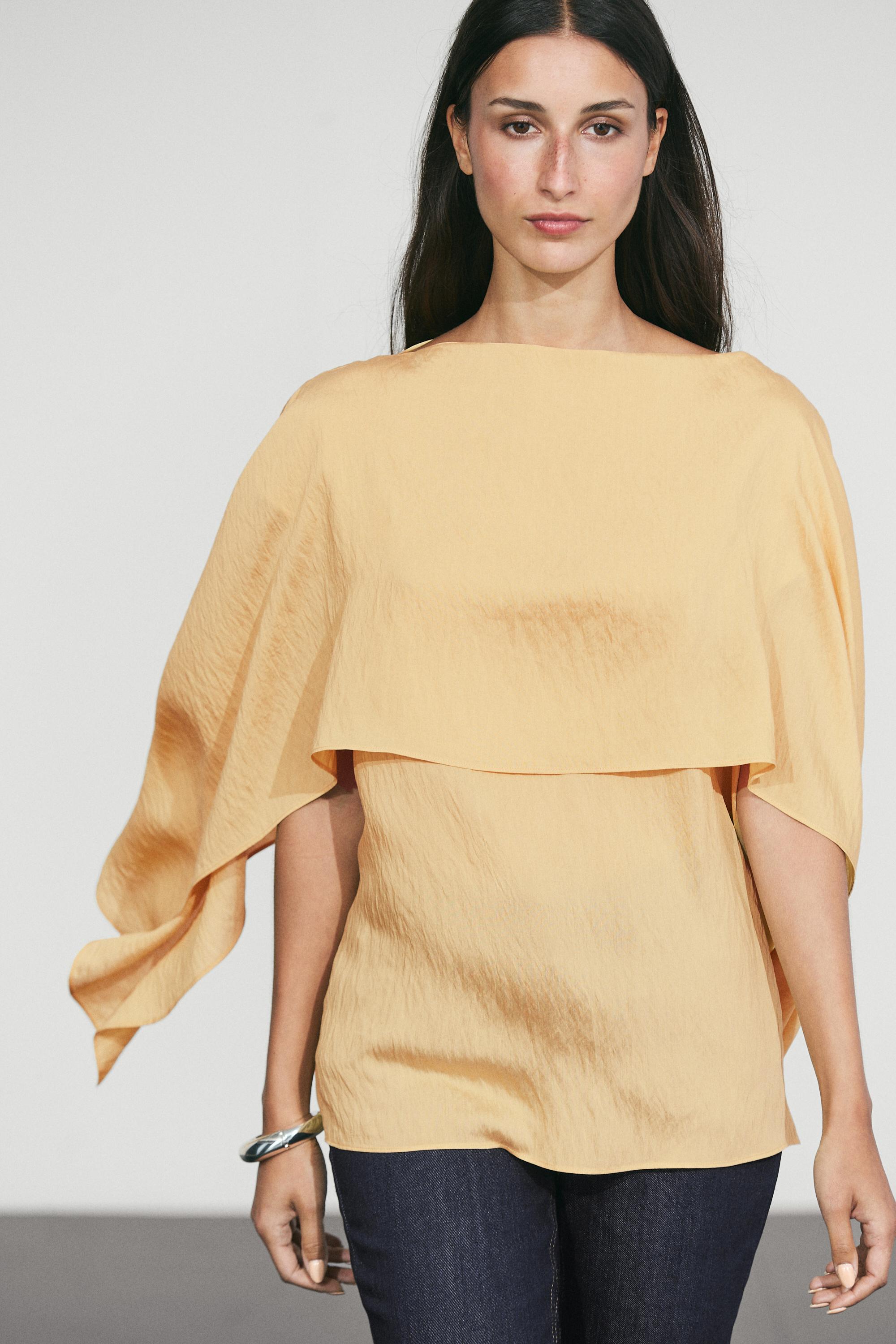 Flowing cape-style blouse