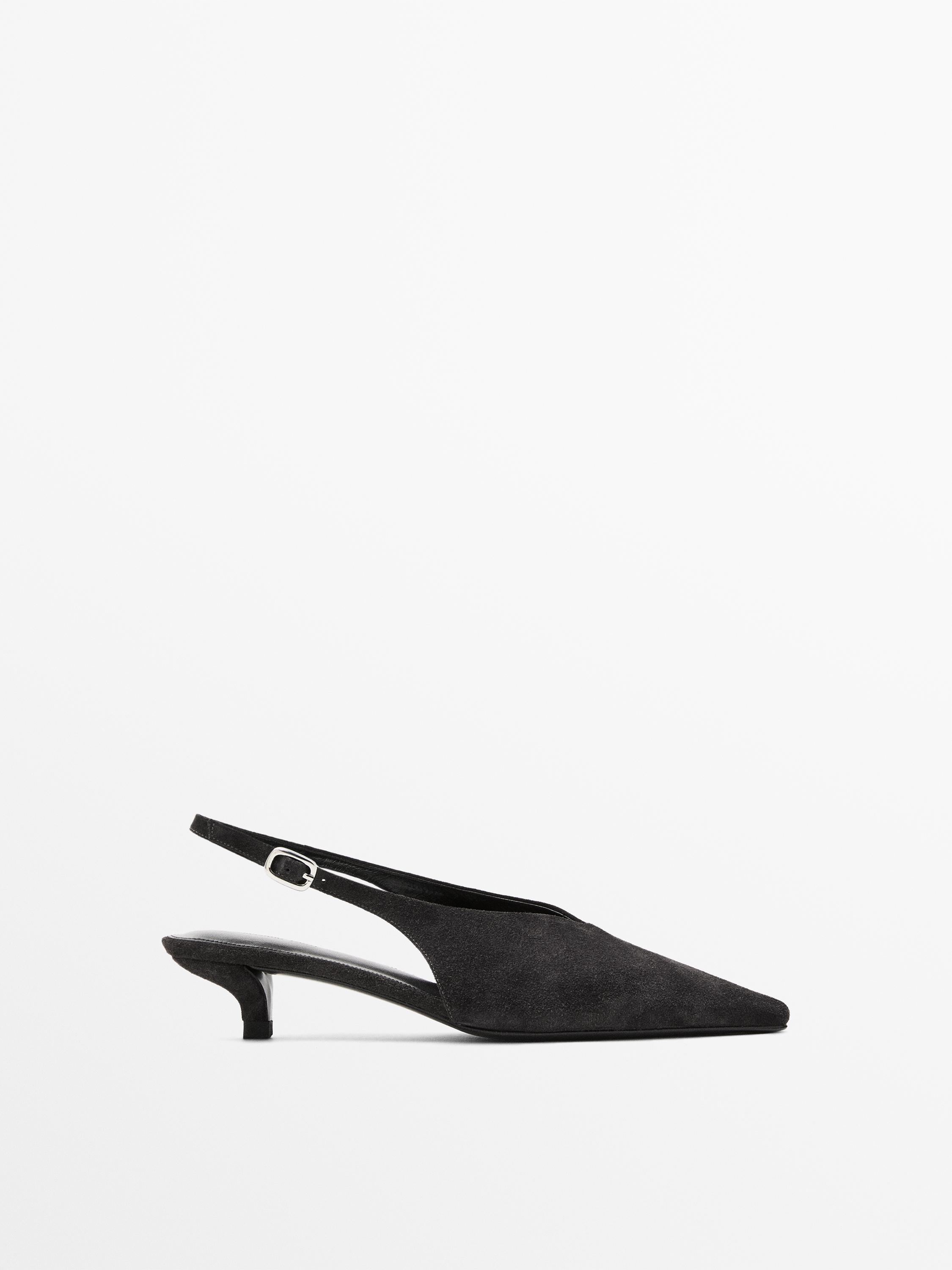 Chaussures croûte de cuir à talon ouvertes à l’arrière