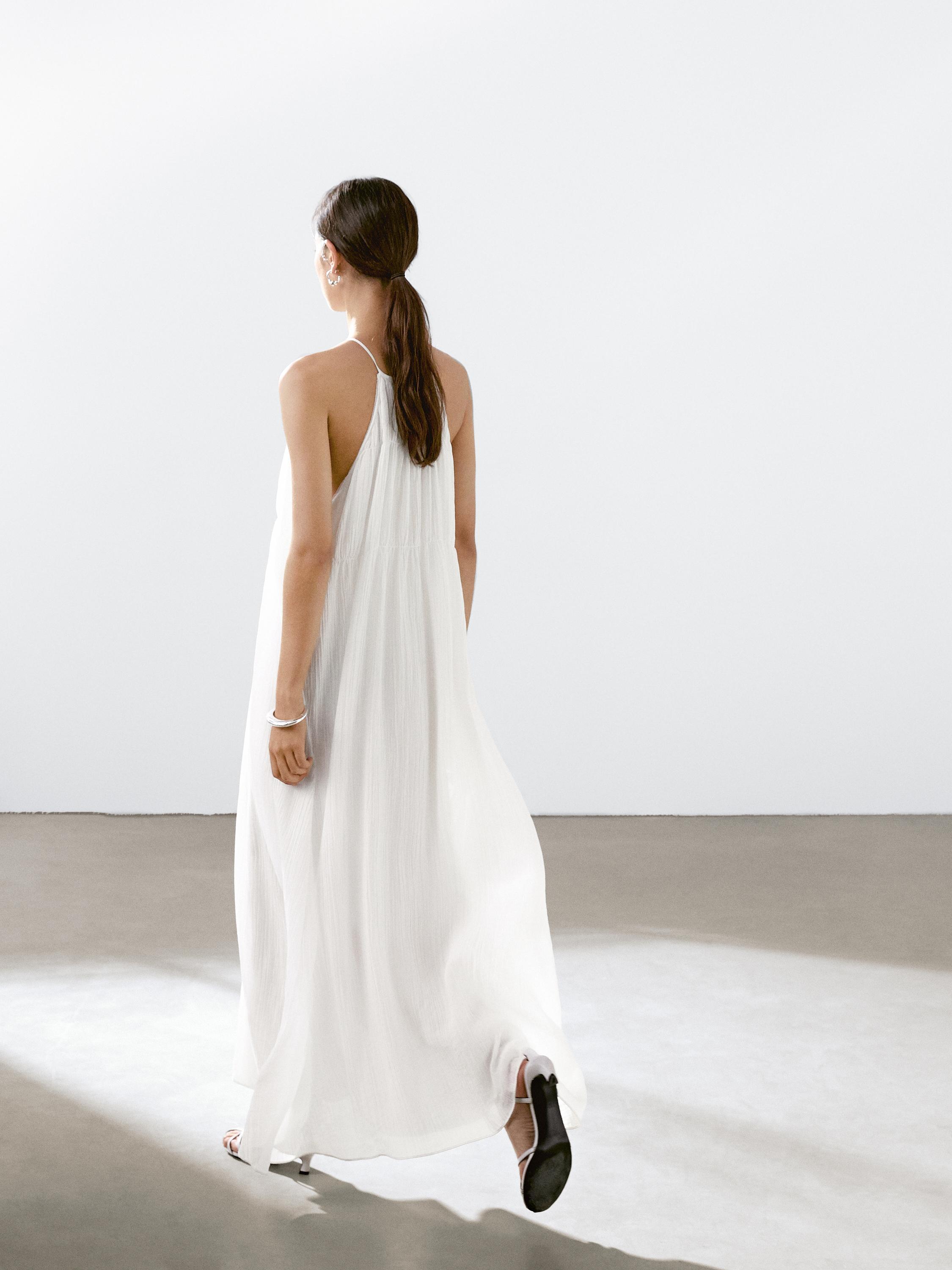 Long pleated dress with gathered detail