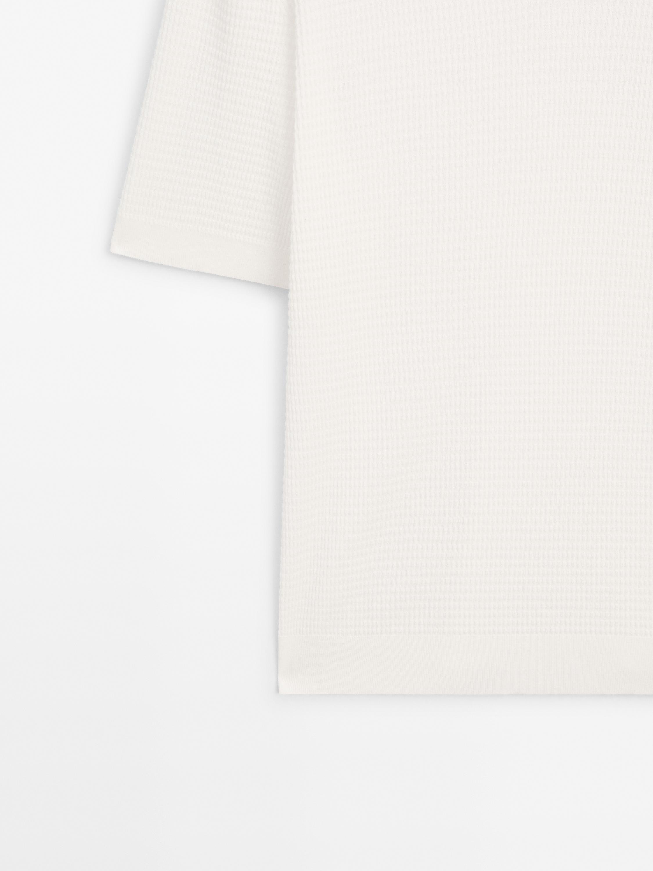 Pull polo col en V manches courtes