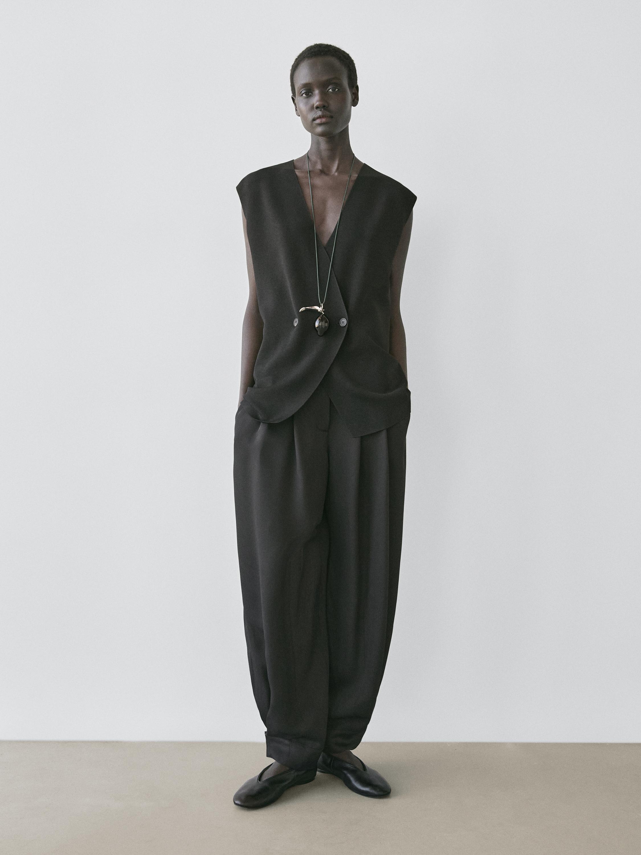 Long double-breasted vest — BLACK