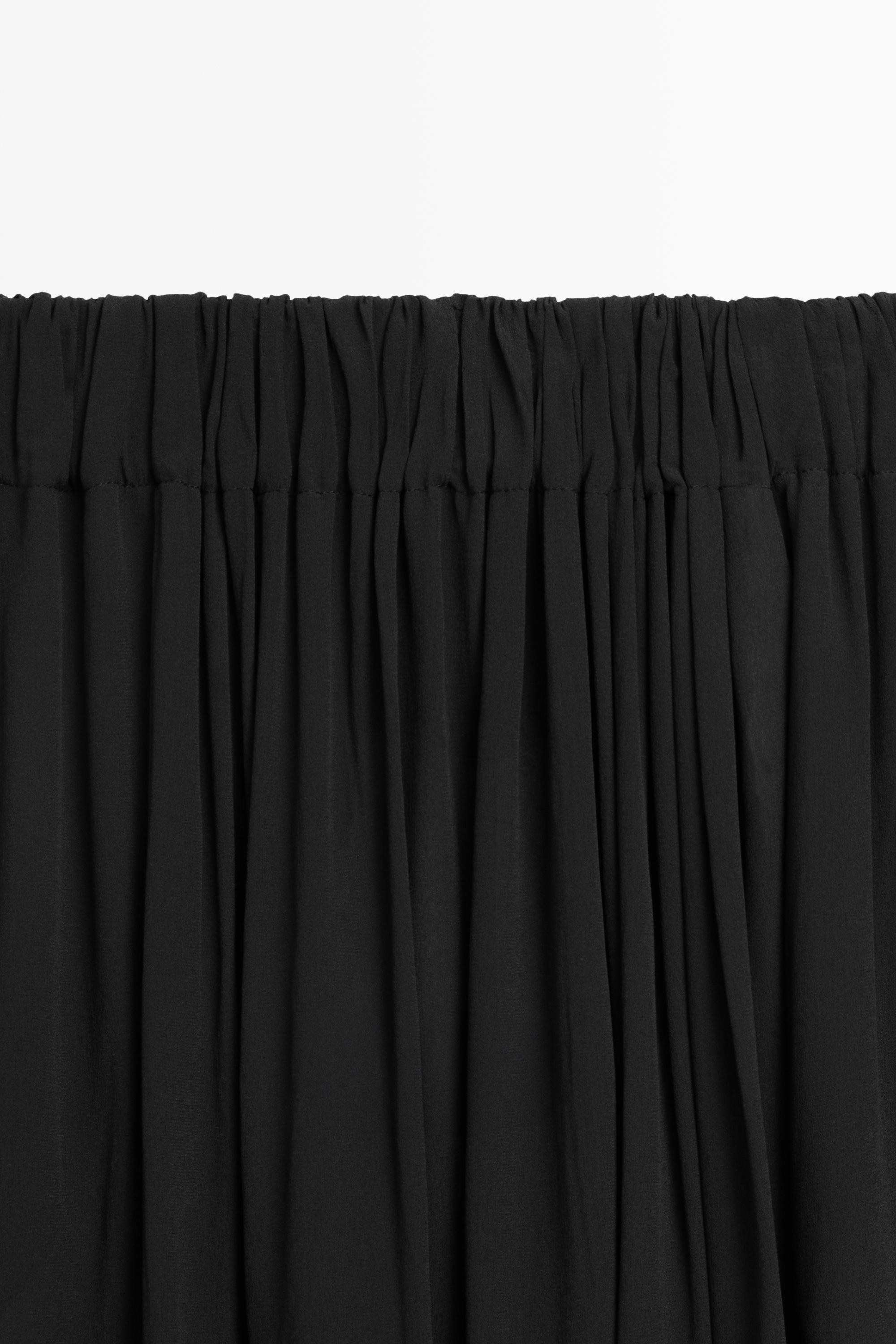 Pleated midi skirt — BLACK