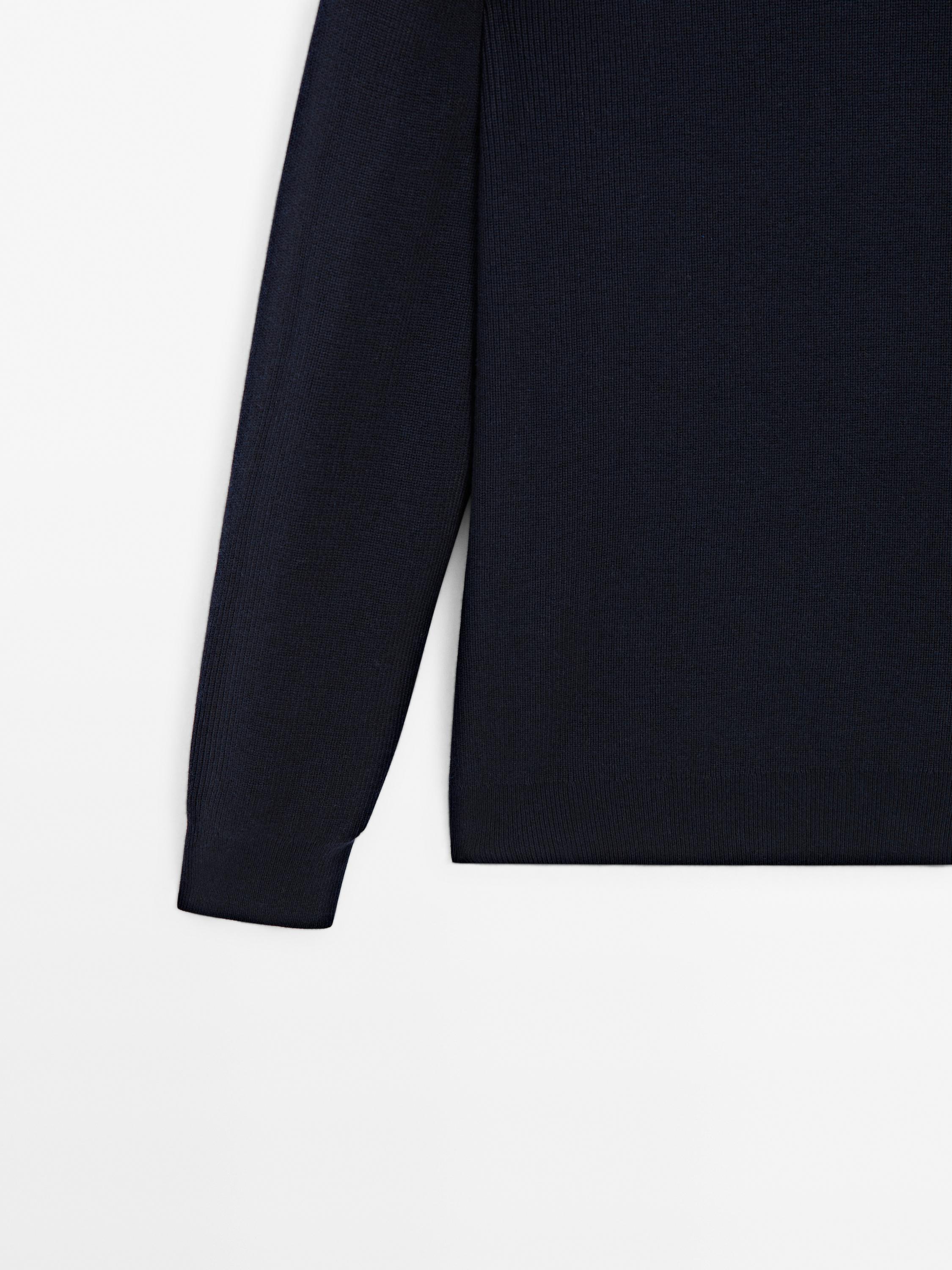 Pull en maille à col montant