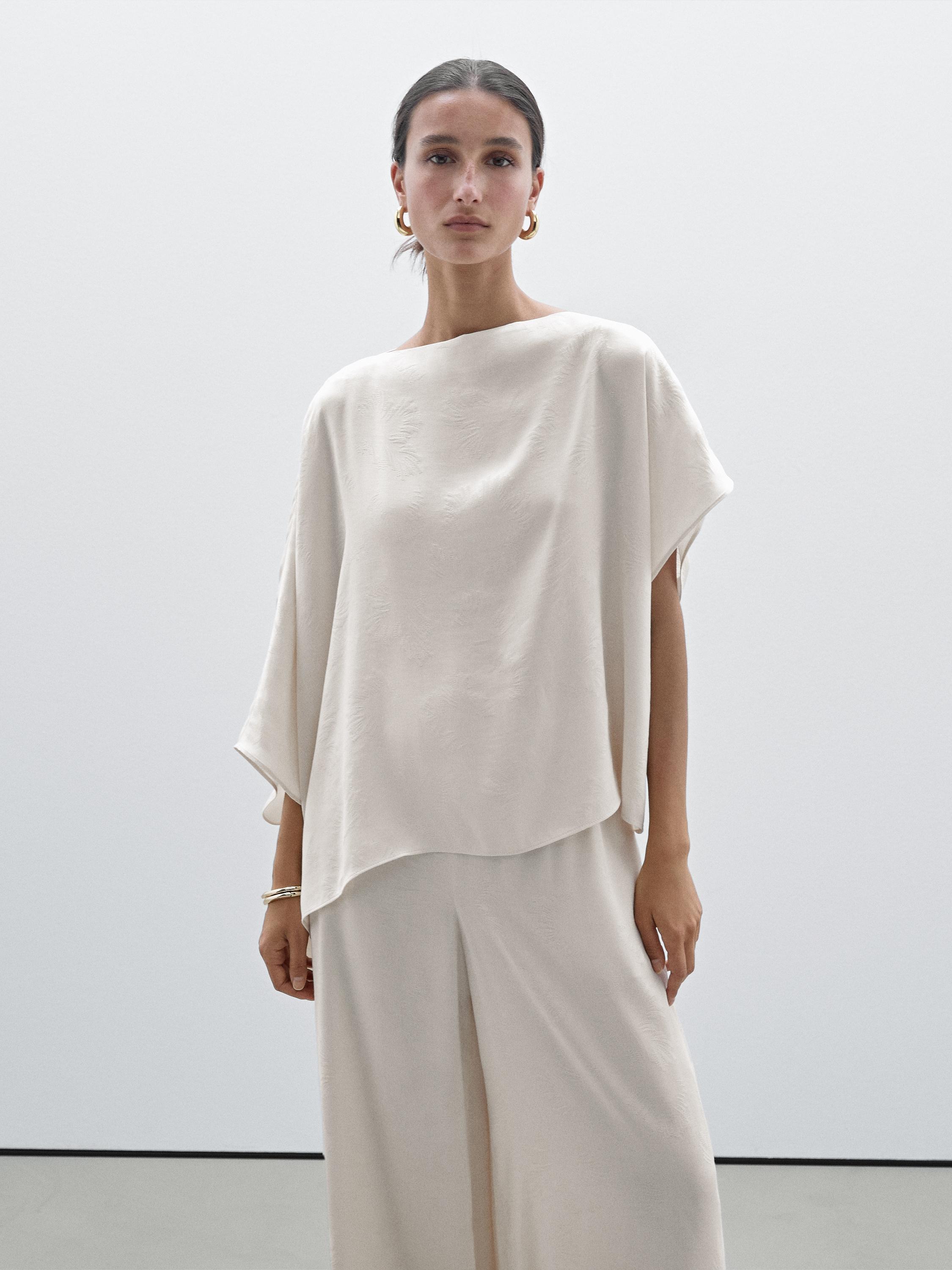 Printed fabric trousers with hem detail