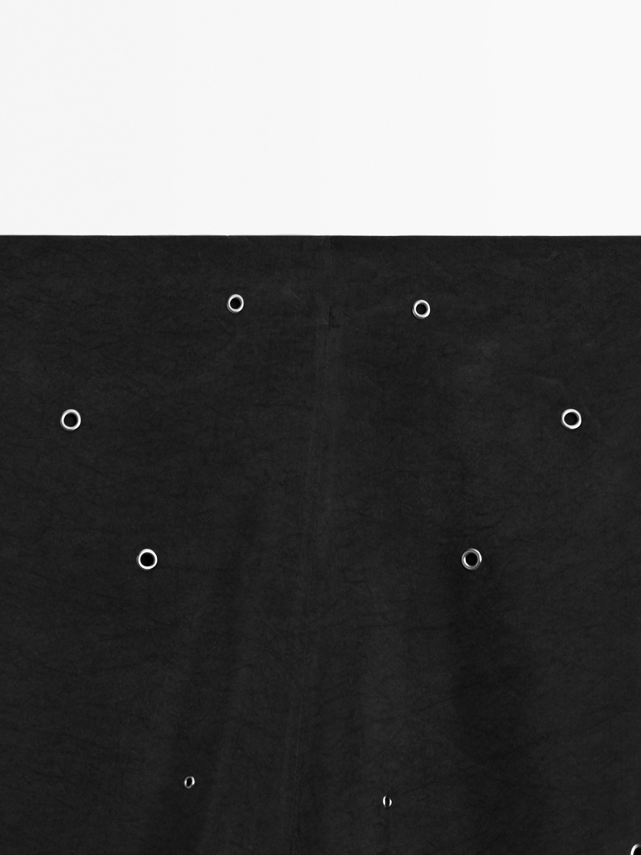 Long skirt with eyelets