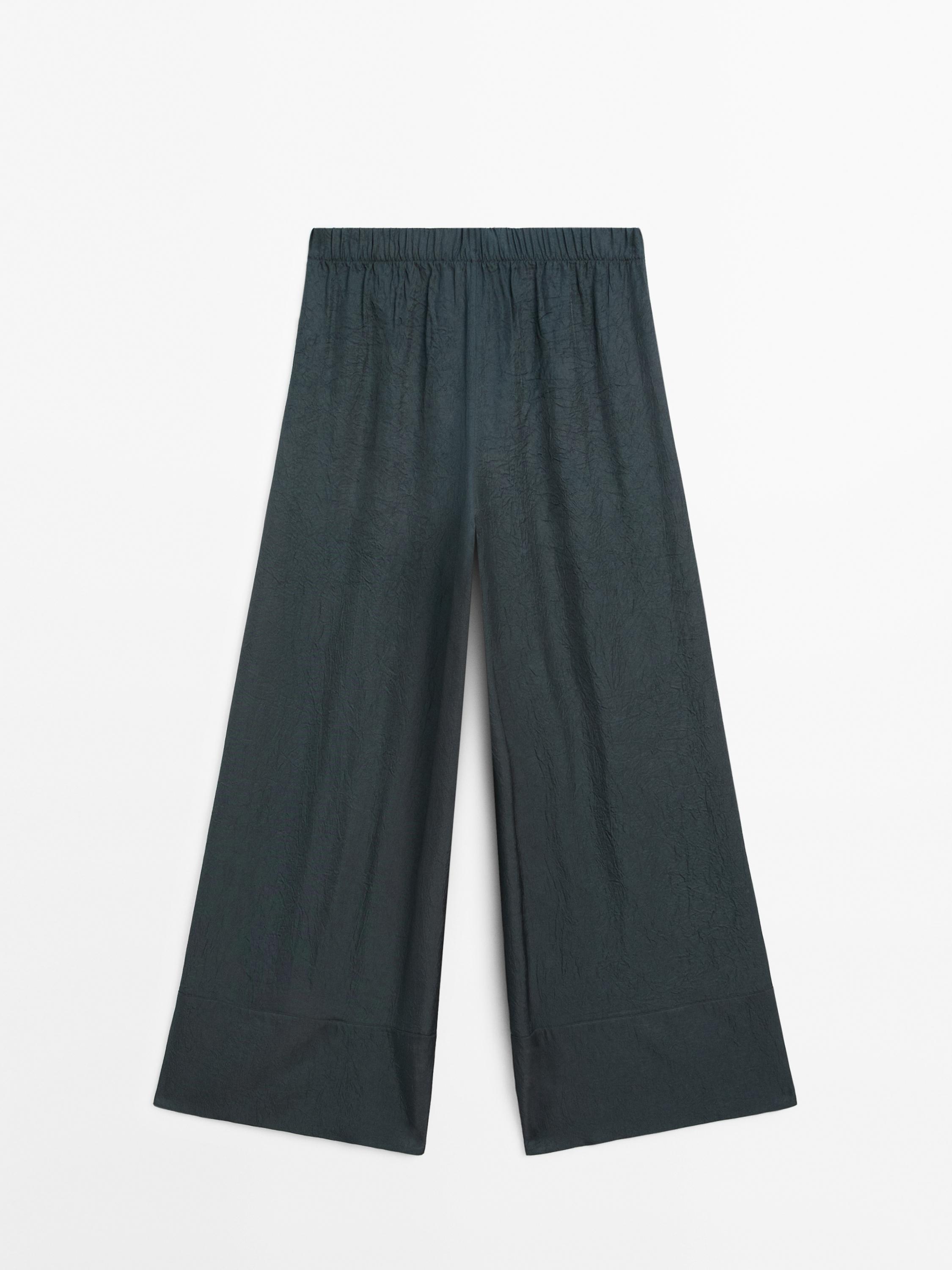 Pantalón fluido efecto arrugado