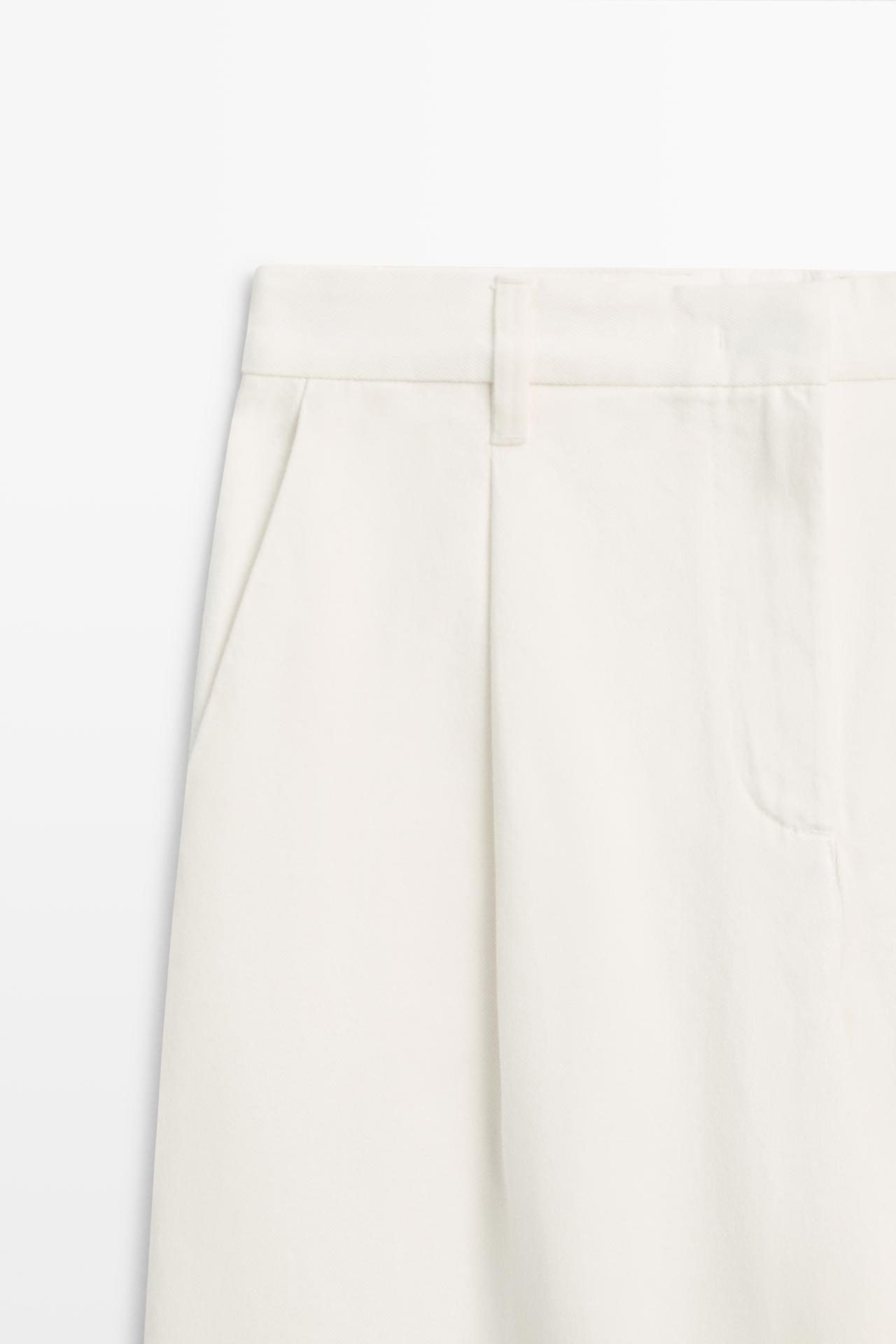 Low-rise pleated wide-leg pants — Off white