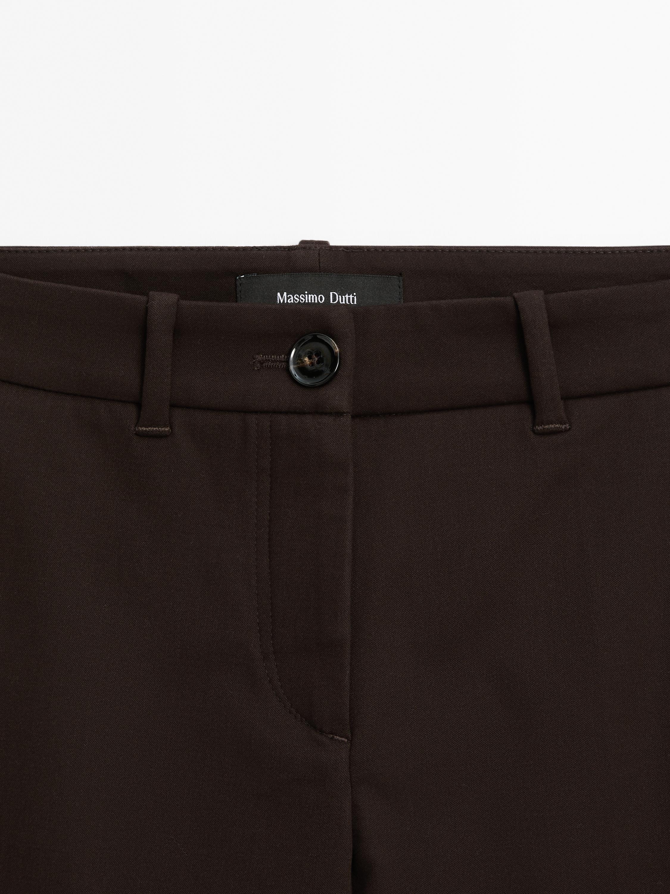 Low-rise slim fit flared trousers