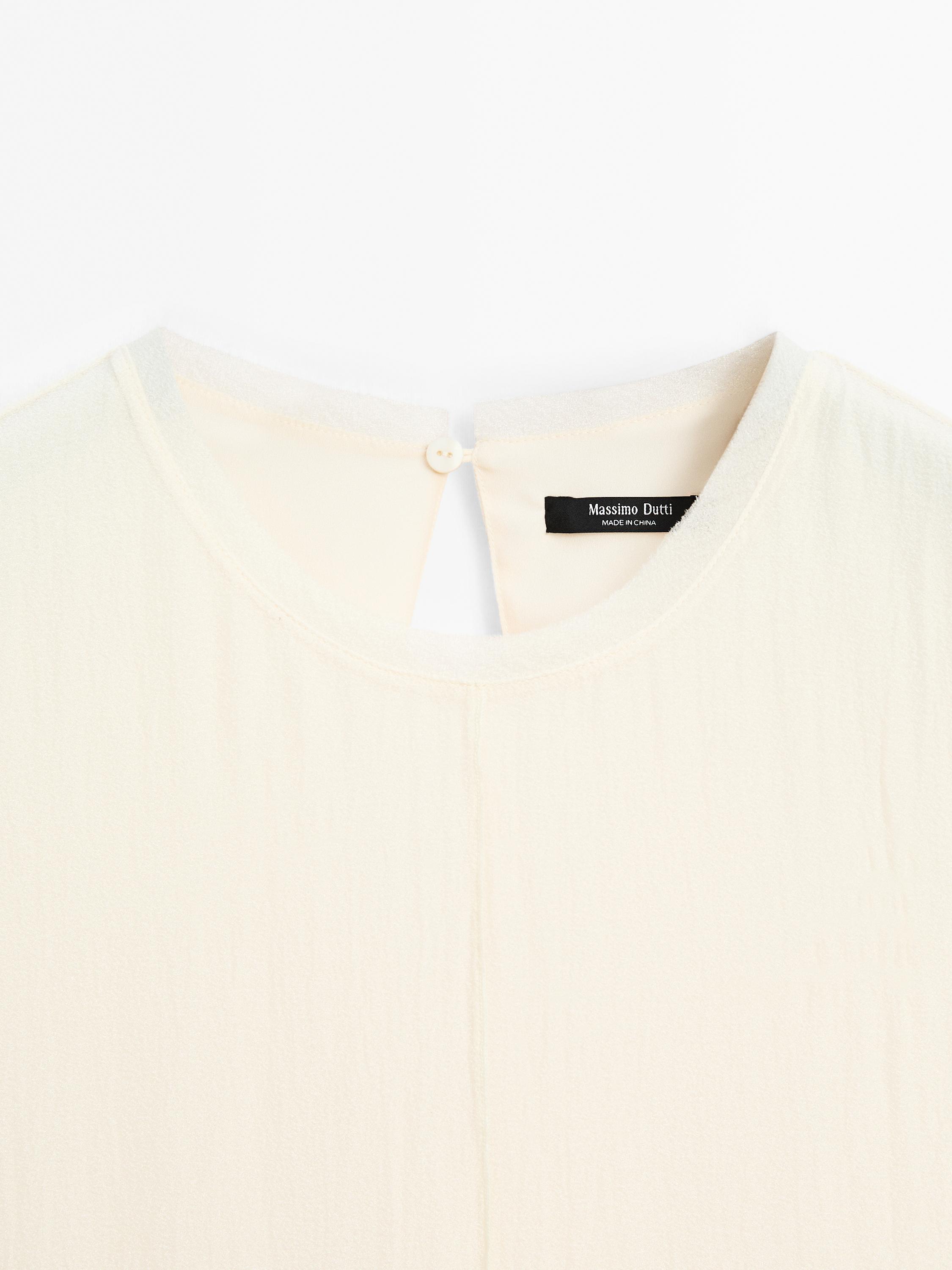 Tunic top with embroidered details