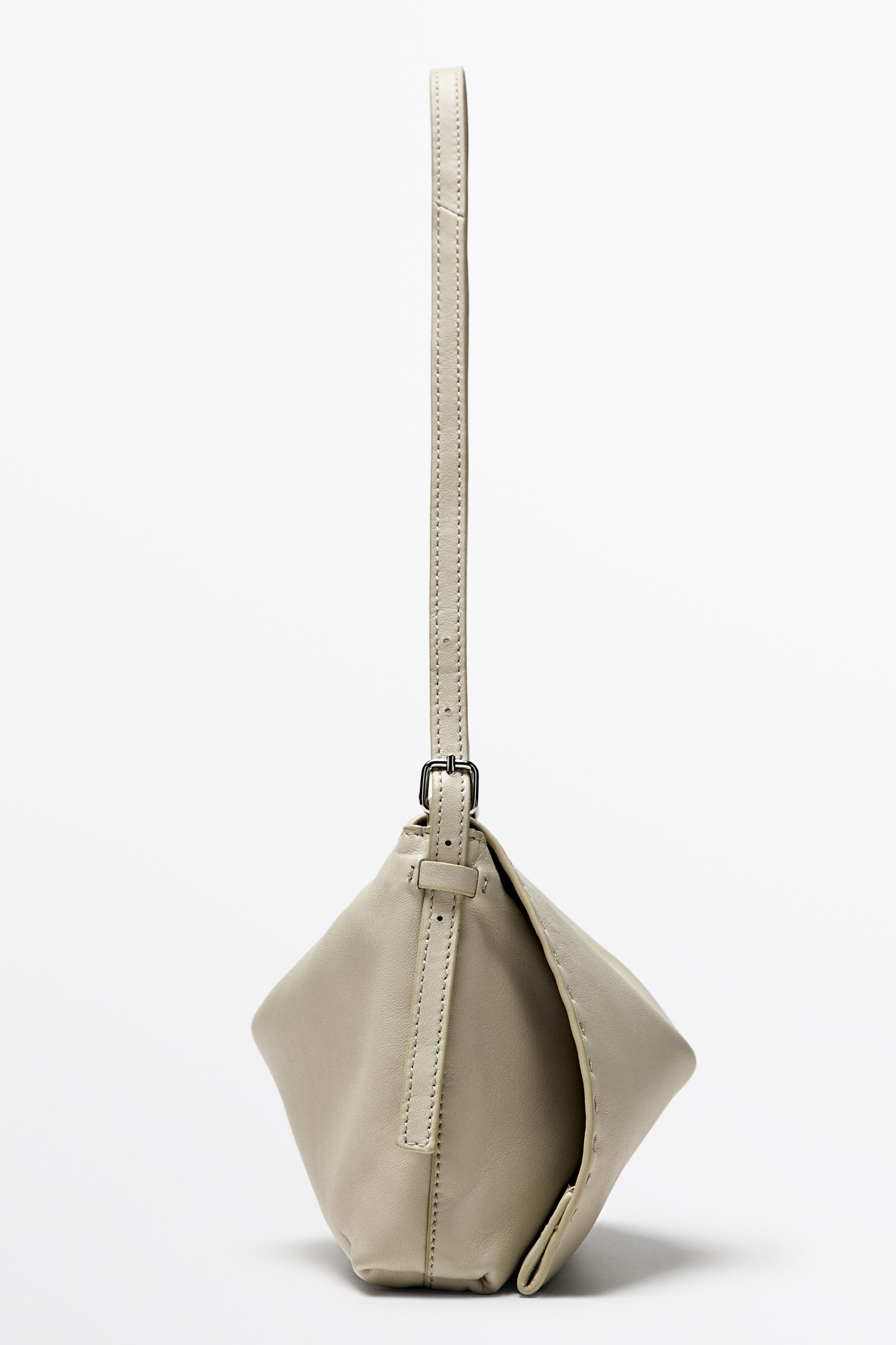 Nappa leather crossbody bag with topstitching — Gold