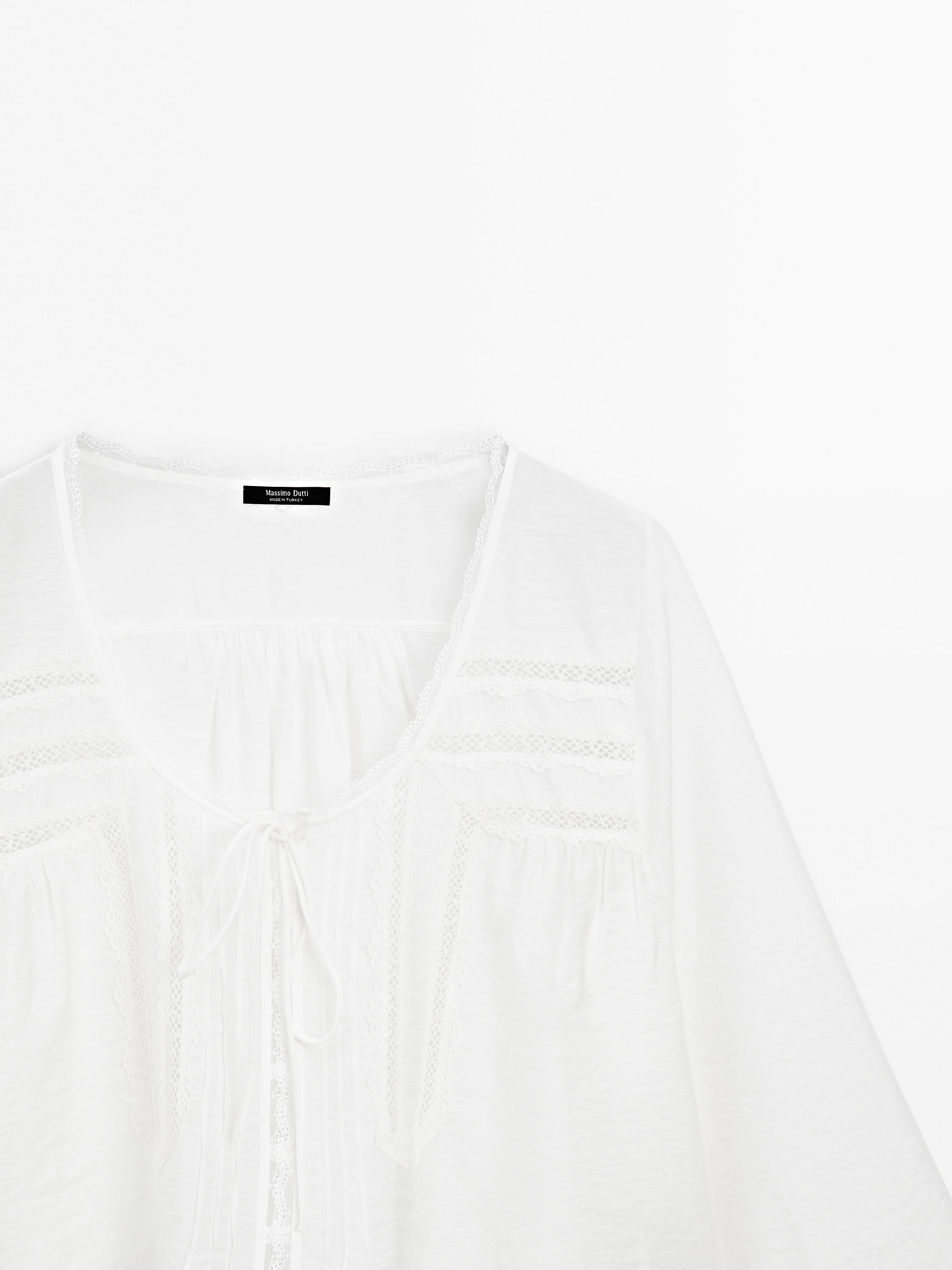 Flowing blouse with lace trim