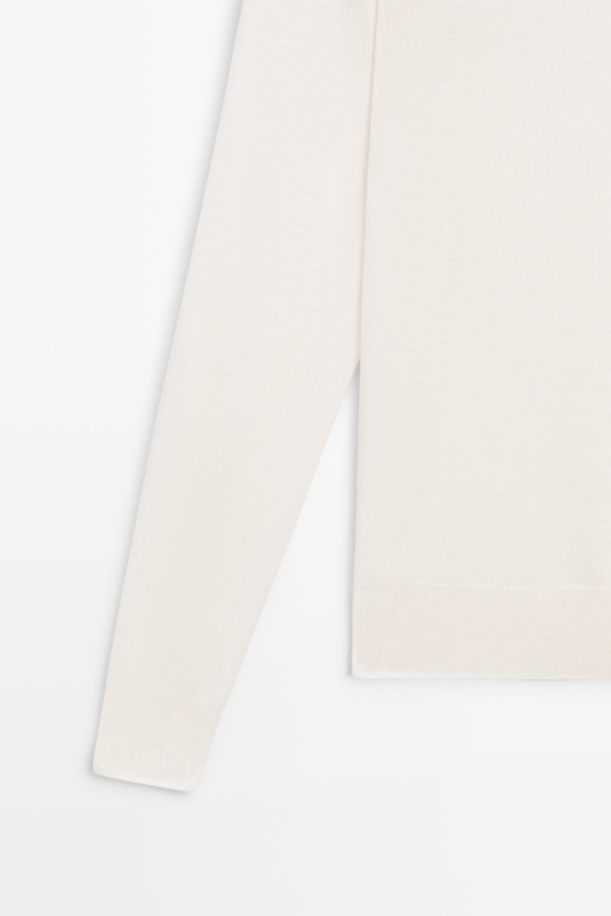 V-neck knit sweater — CREAM