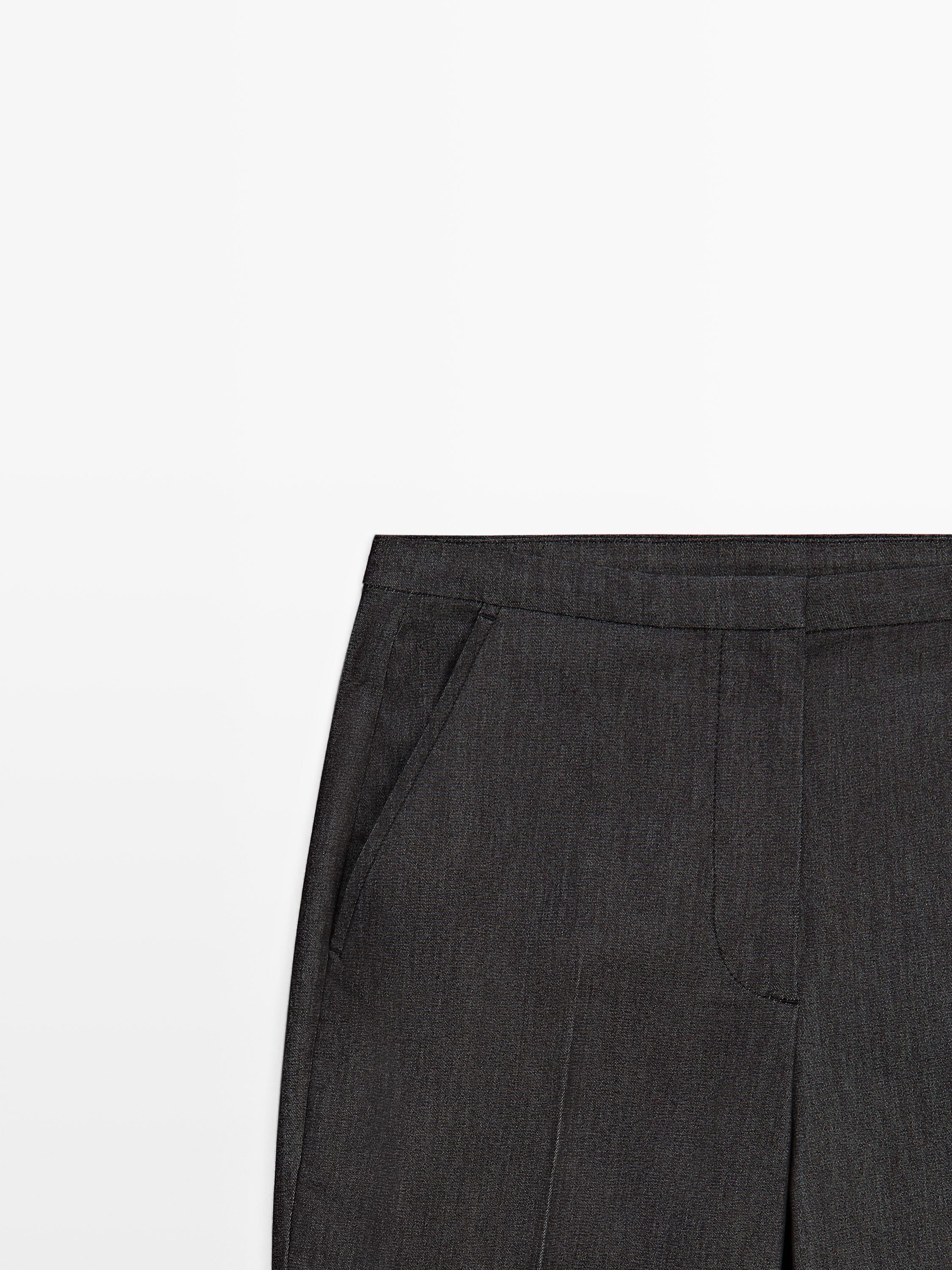 Denim-effect flared trousers — BLACK