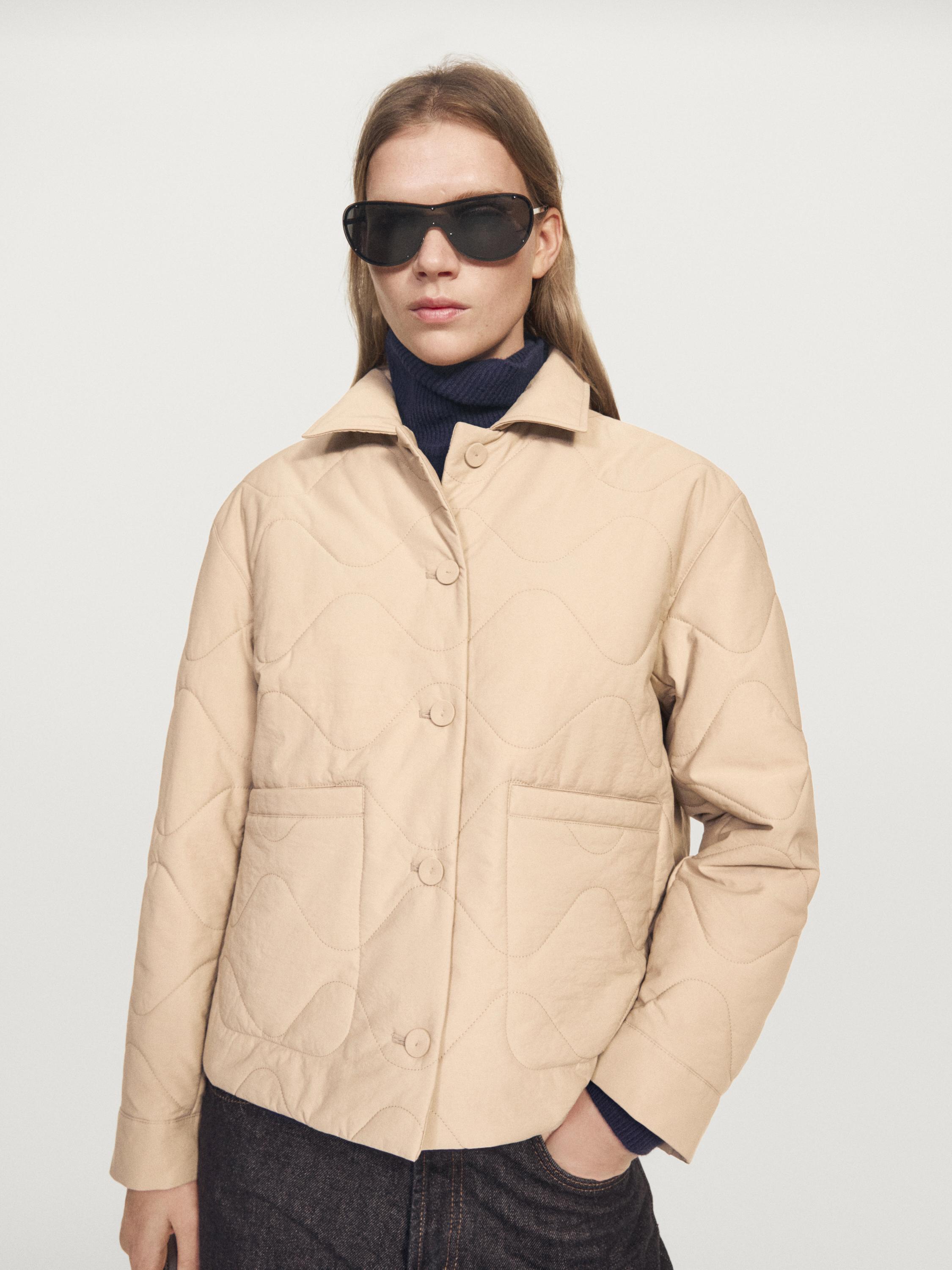 Puffer jacket with seam details