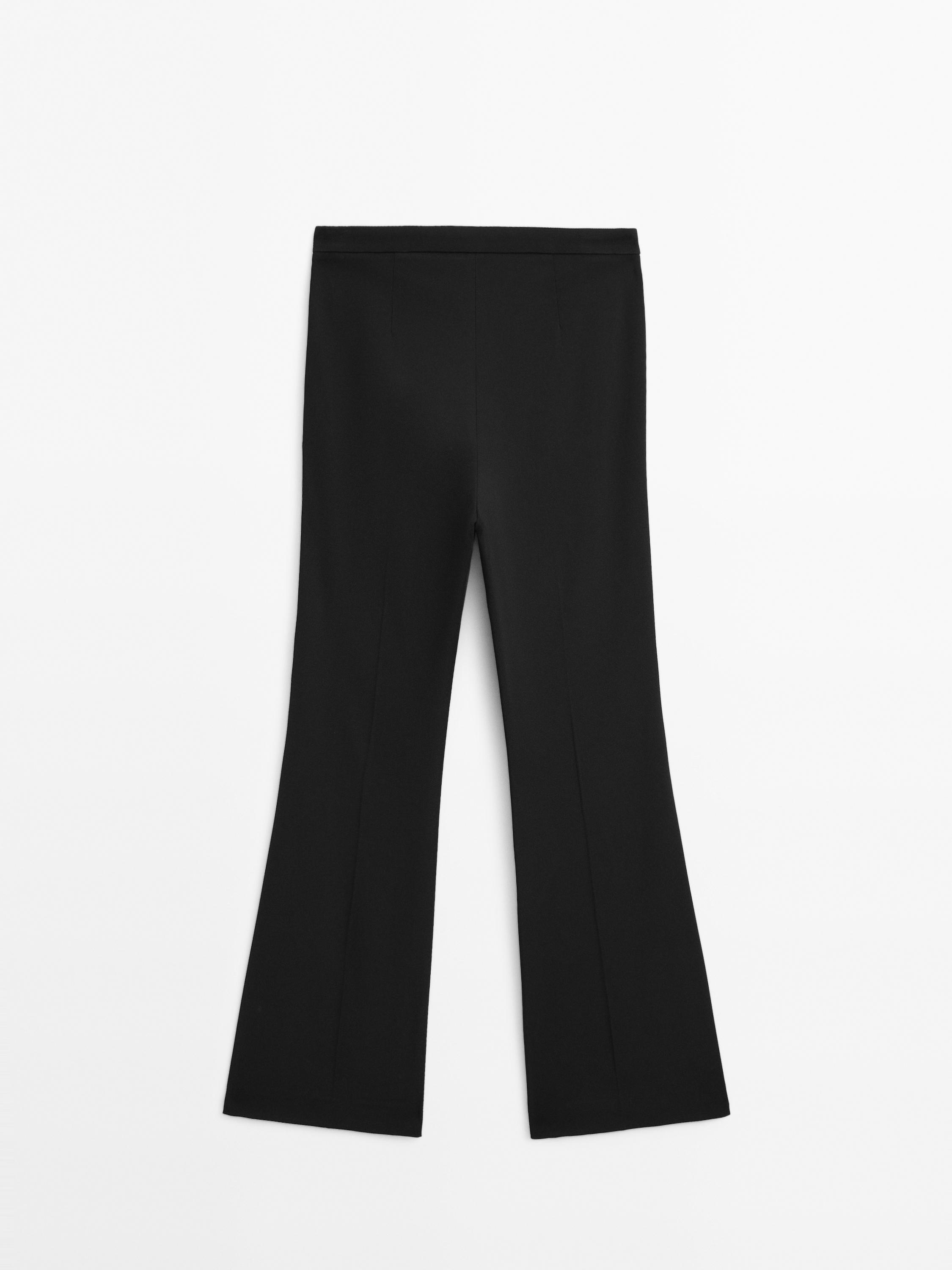 Flared trousers with pocket — BLACK