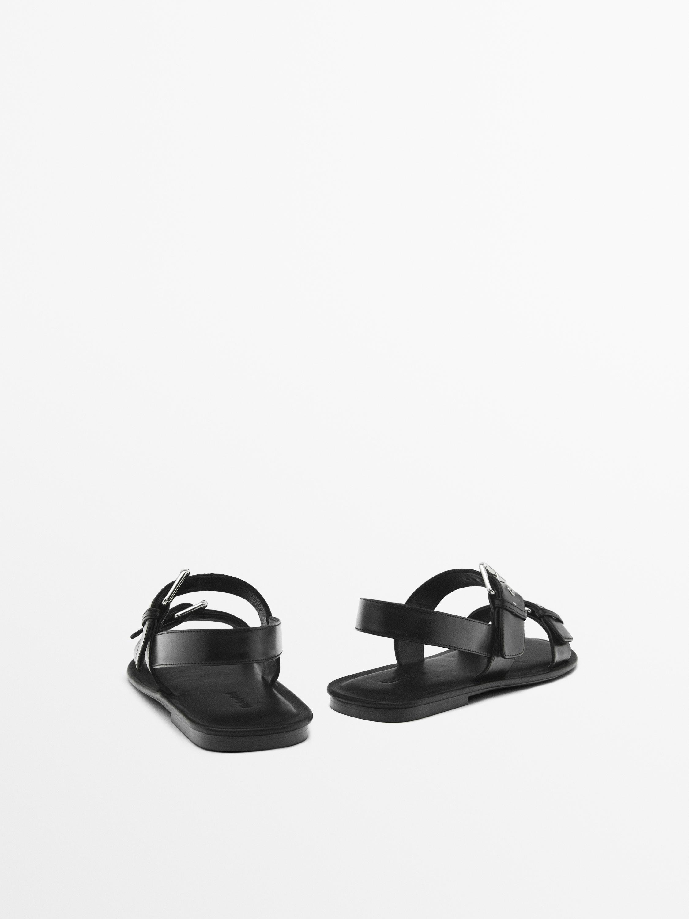 Flat slider sandals with buckles