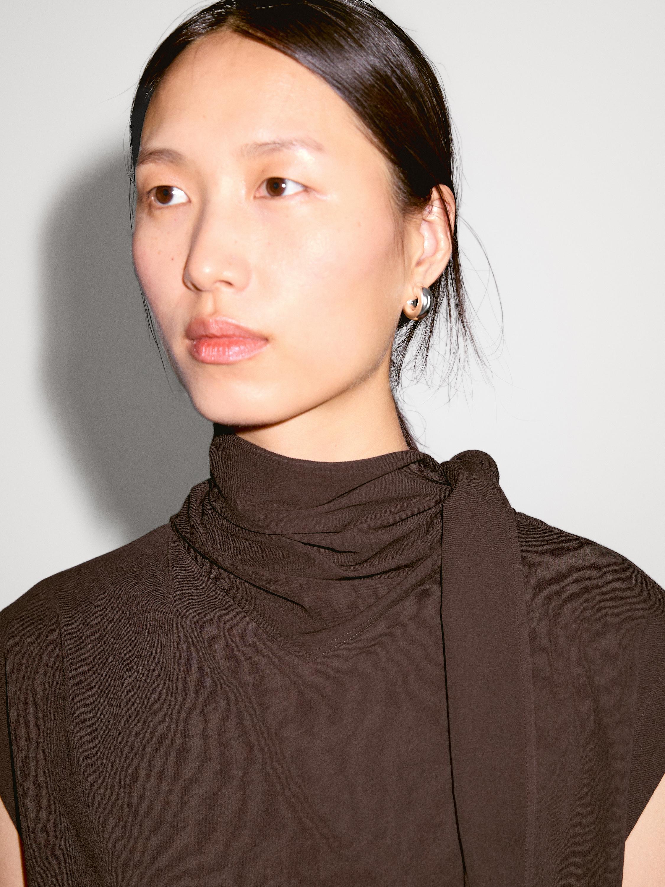 Top with tied neck detail