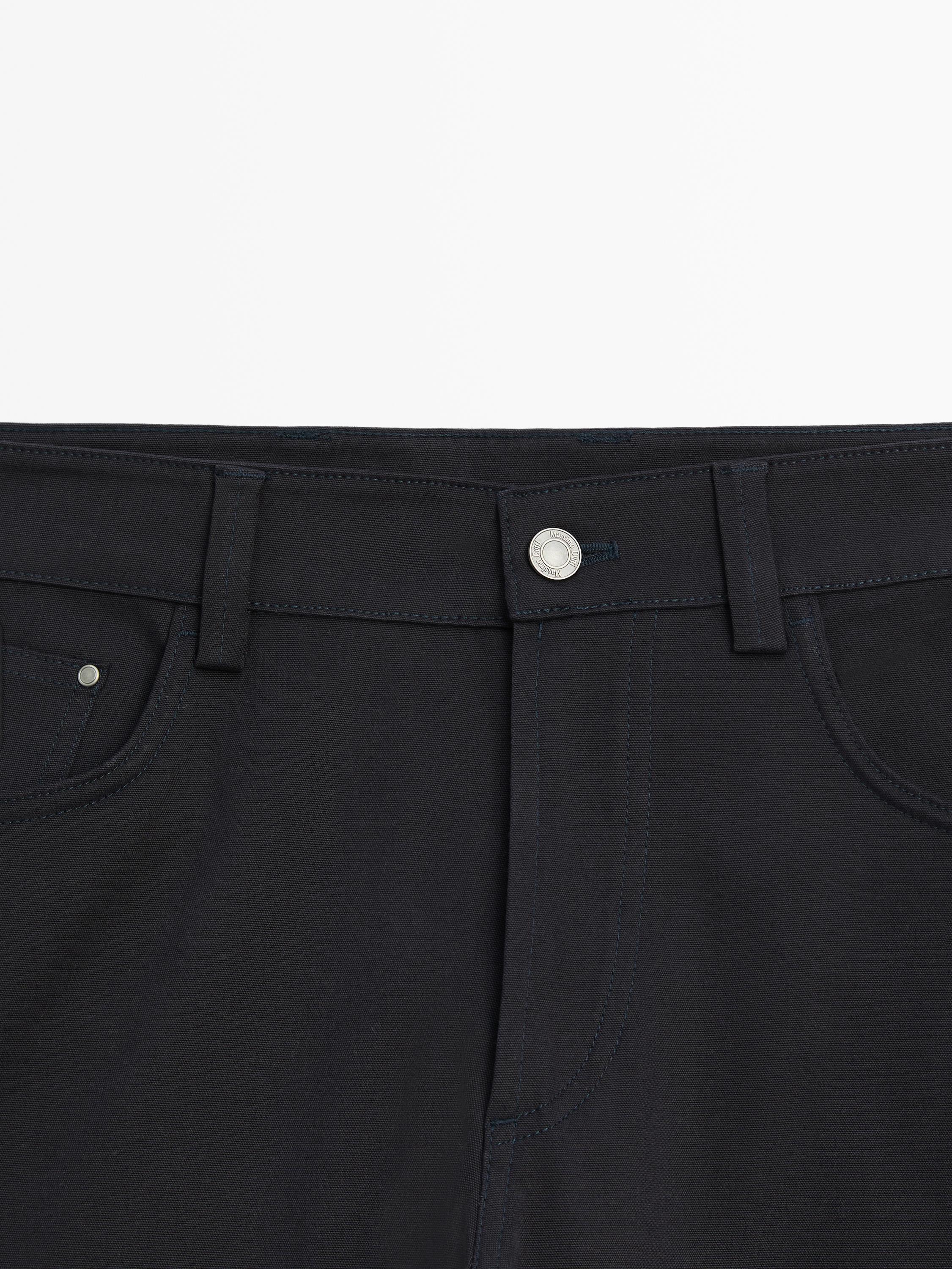 Cotton blend tapered fit jeans