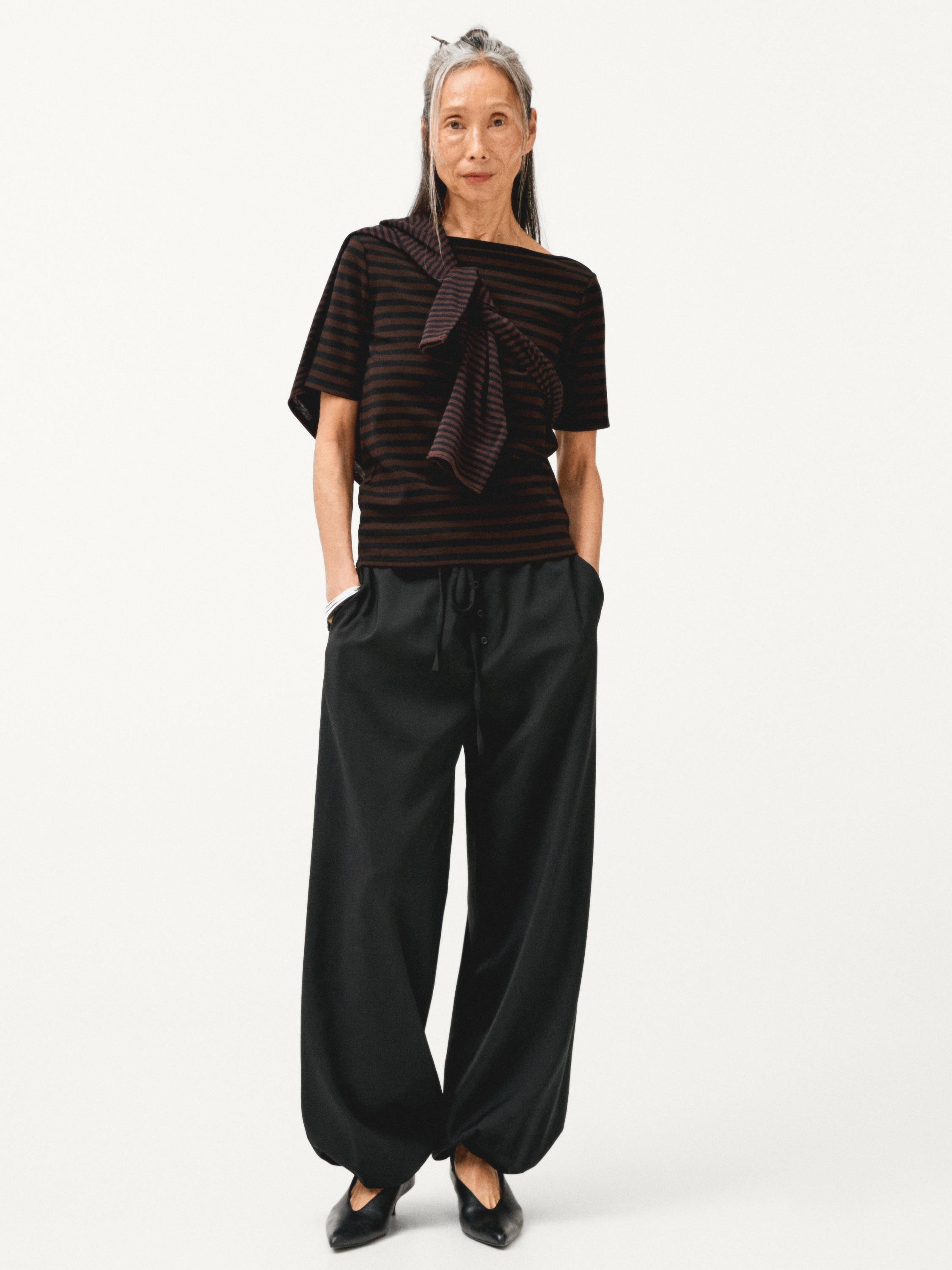 Wool sarouel trousers with tie detail — BLACK