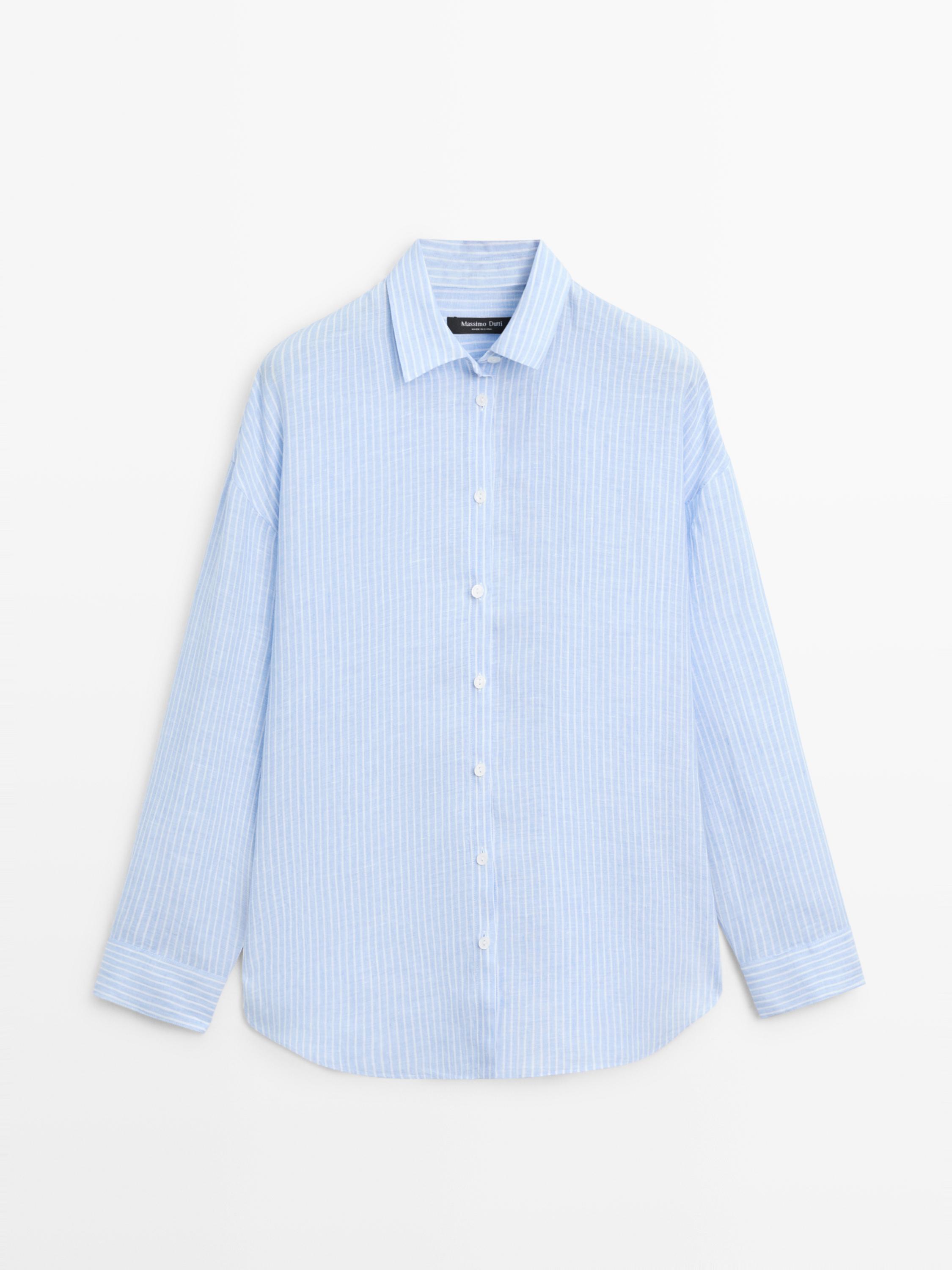 Vue frontale d'une chemise bleu ciel à rayures verticales blanches, col classique et patte de boutonnage centrale. Manches longues avec poignets.