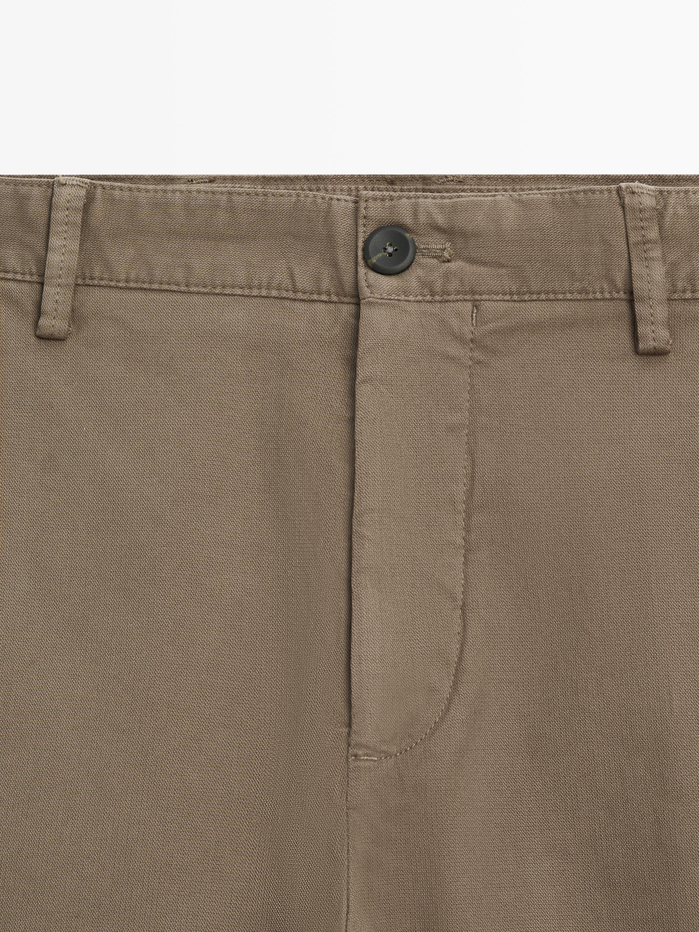 Slim-fit micro-textured trousers — GREEN