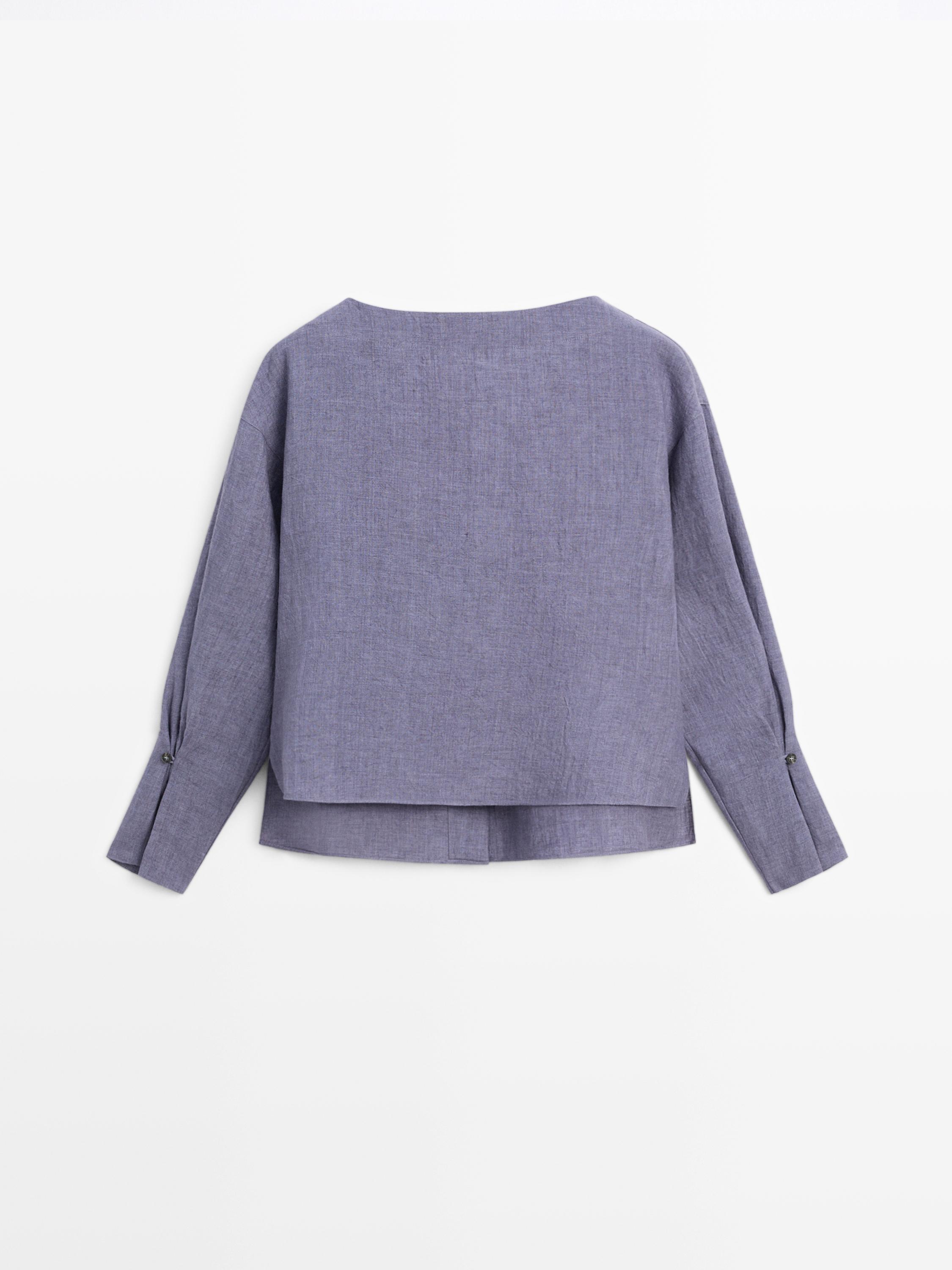 Blusa escote pico detalle manga