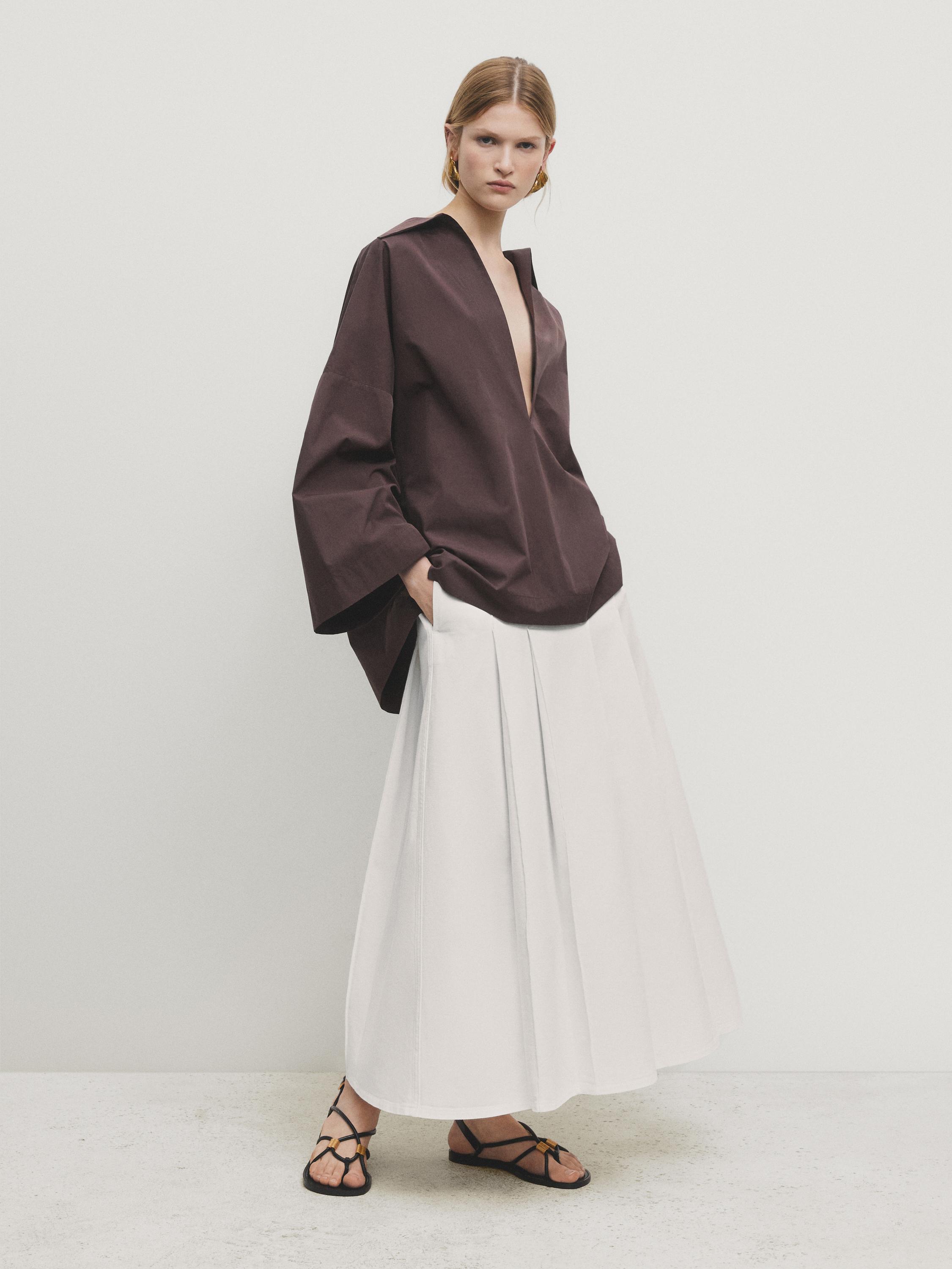 تنورة دنيم بليسيه