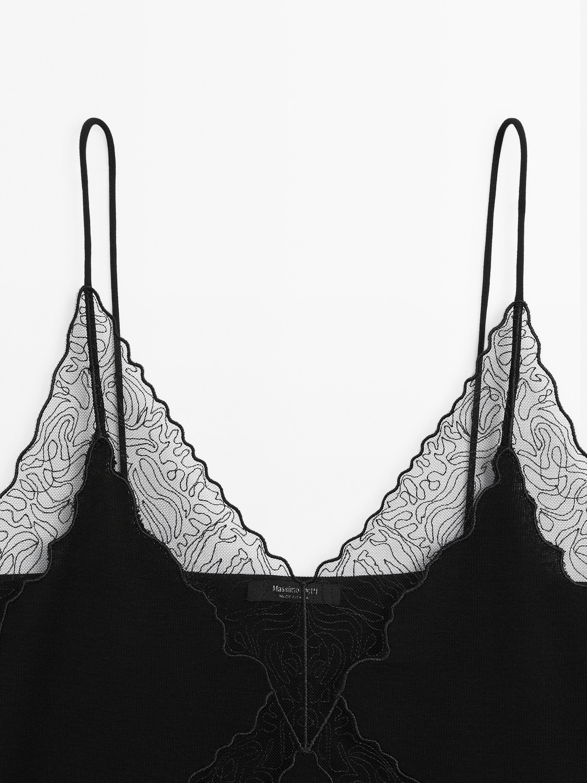 Top à bretelles avec décolleté en dentelle